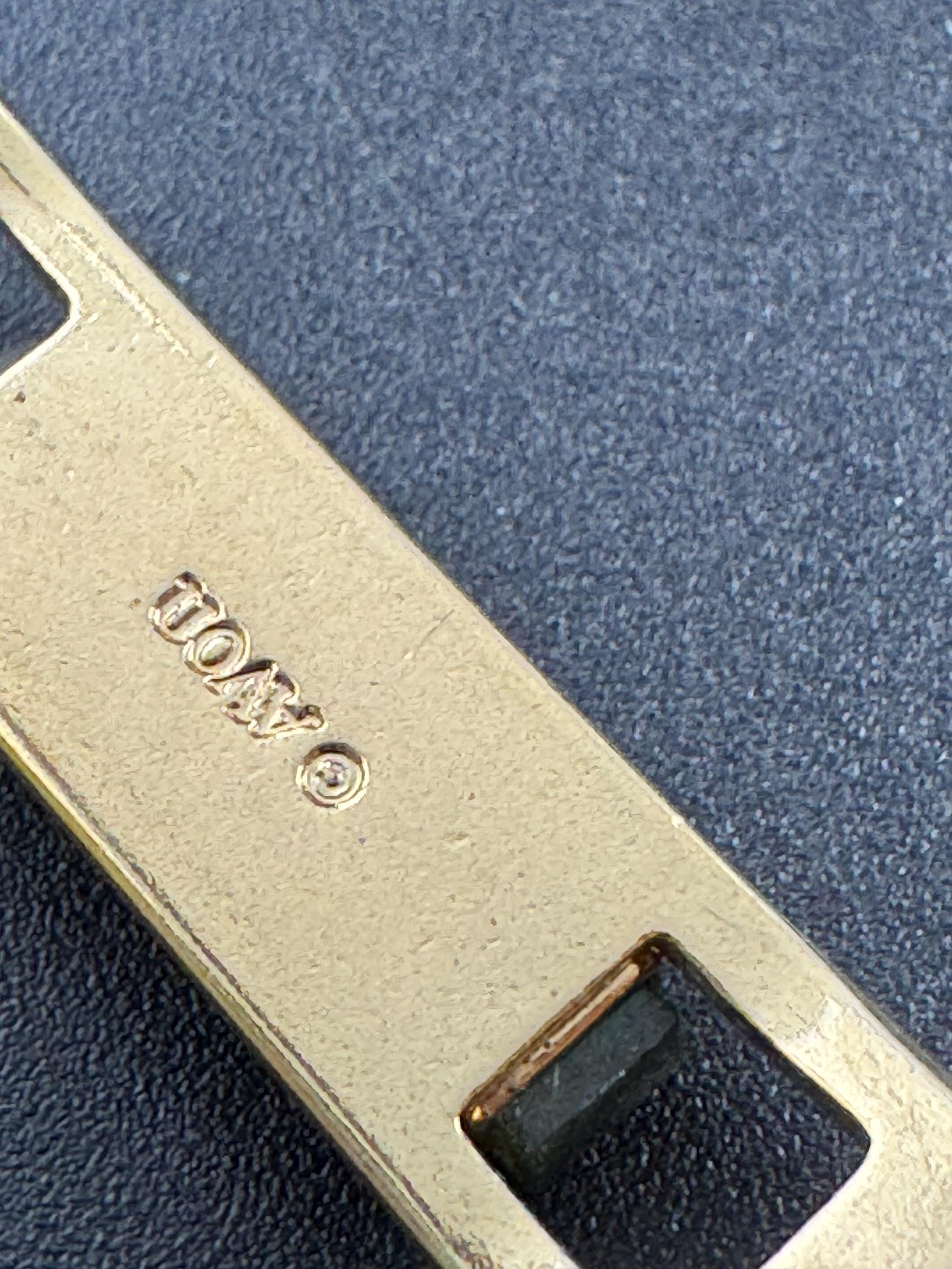 Vintage signed Avon gold tone green jade glass hinged bangle