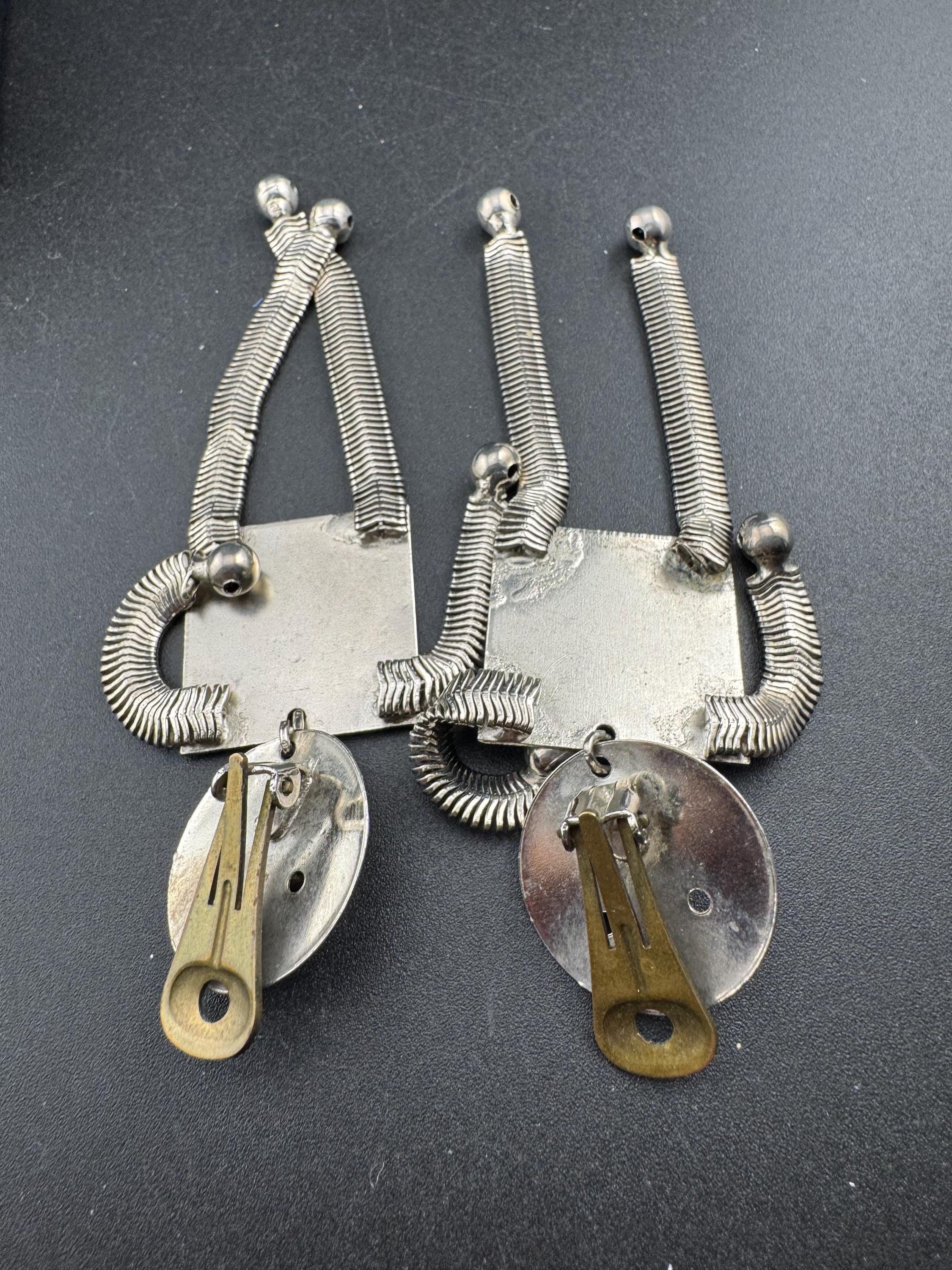 vintage robot clip on earrings , silver tone articulated and oversized