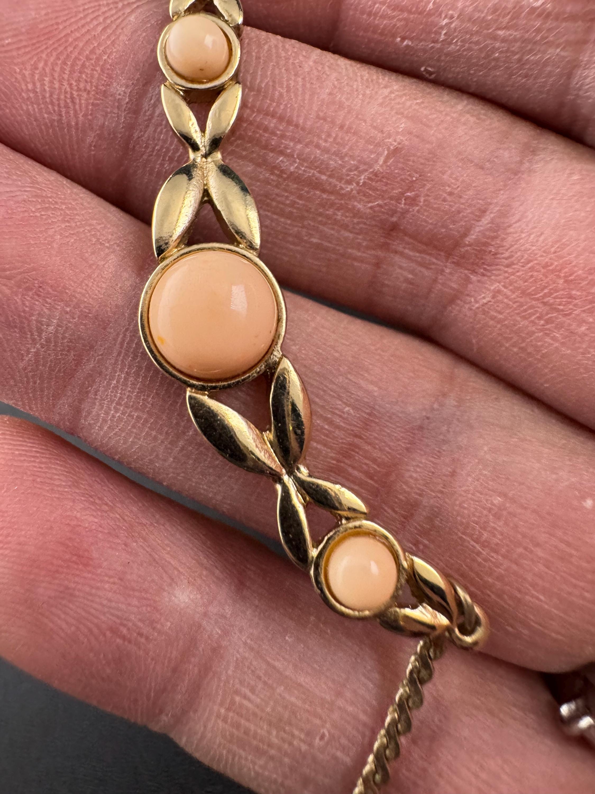 Signed Avon dainty 80s gold flat link chain with coral peach cabochons, plated necklace