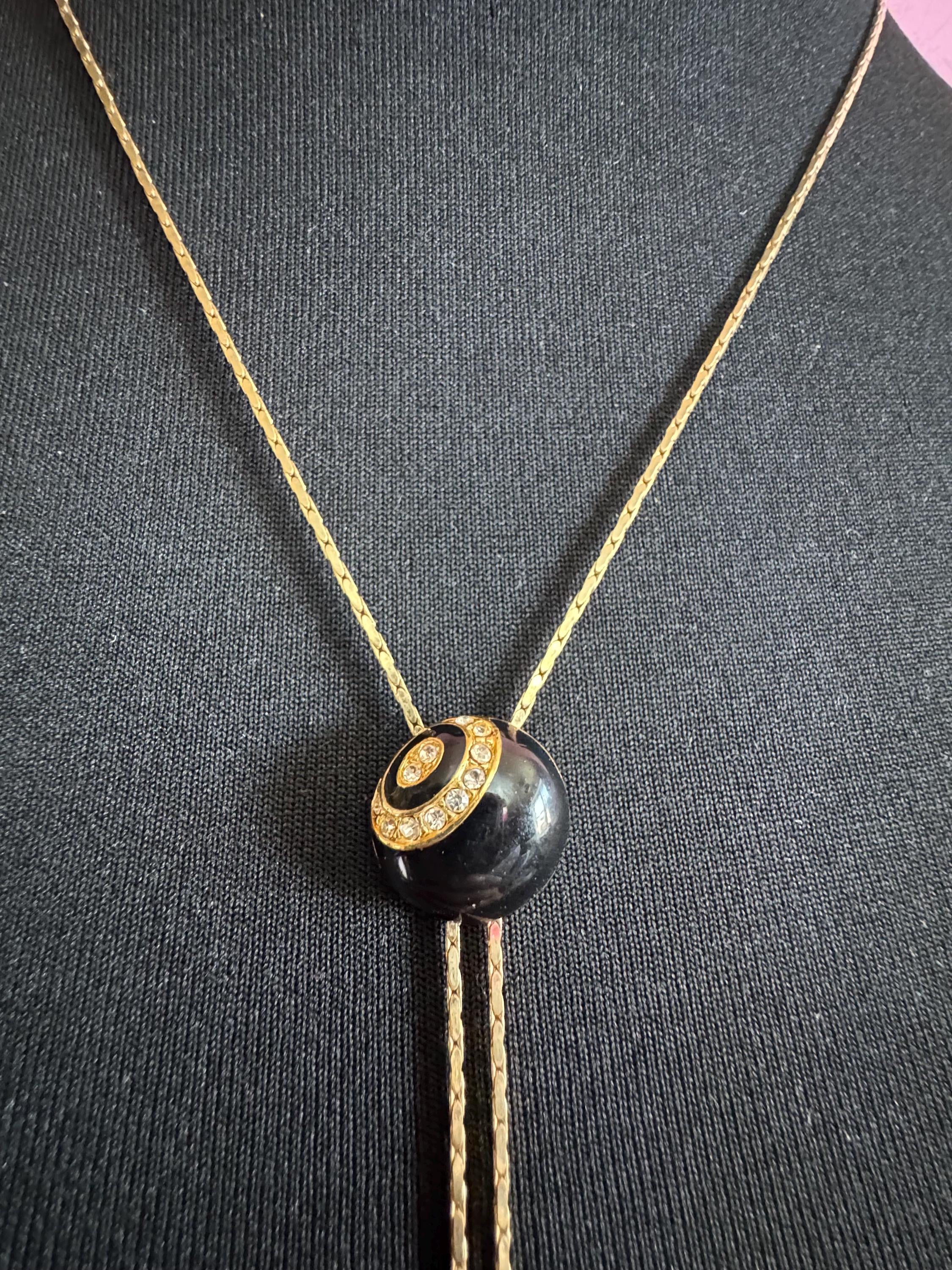Vintage black enamel and crystal slider bolo necklace, with pat no , gold plated