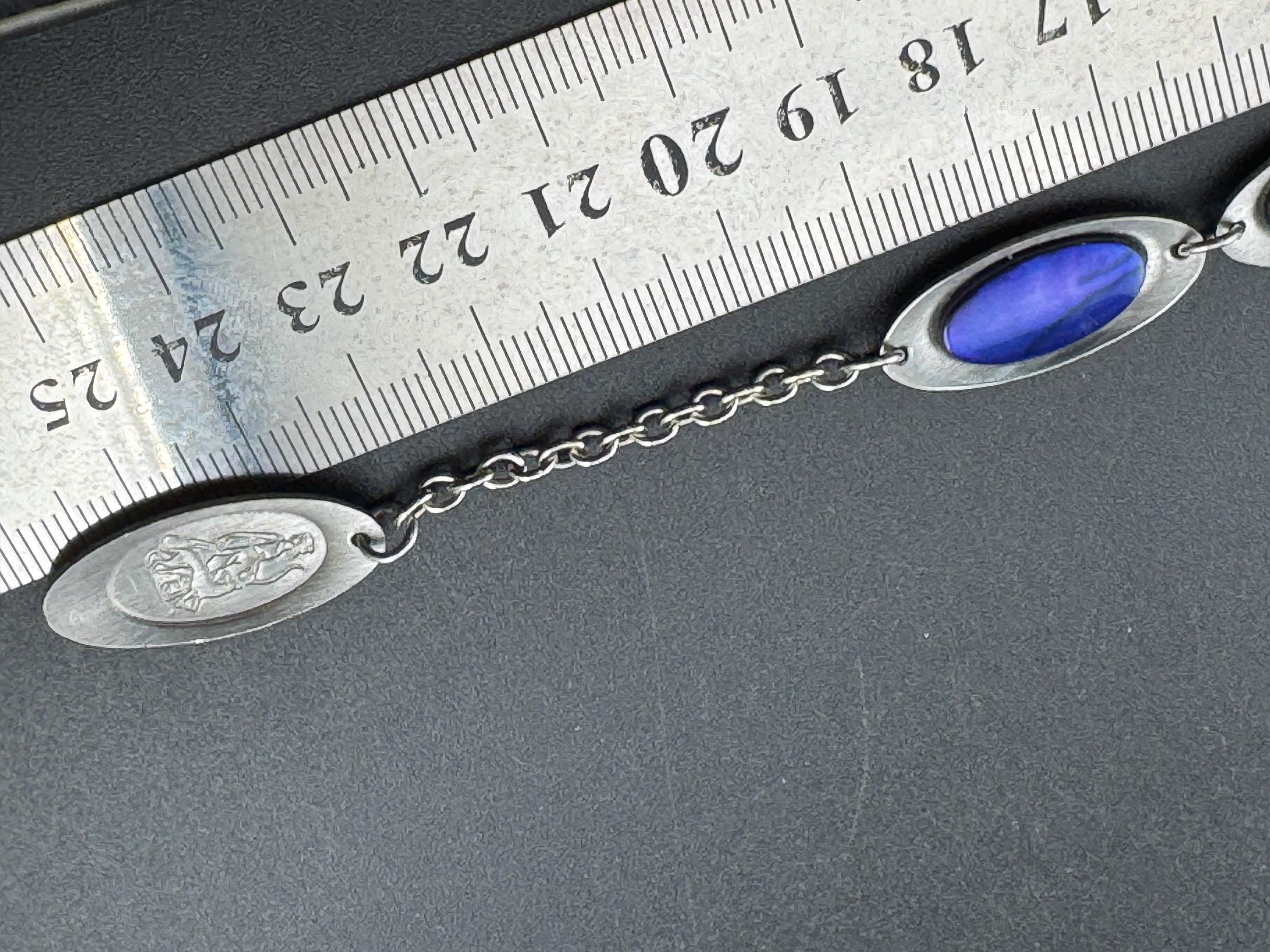 Vintage 1970s stainless steel bracelet , purple shell cabochons