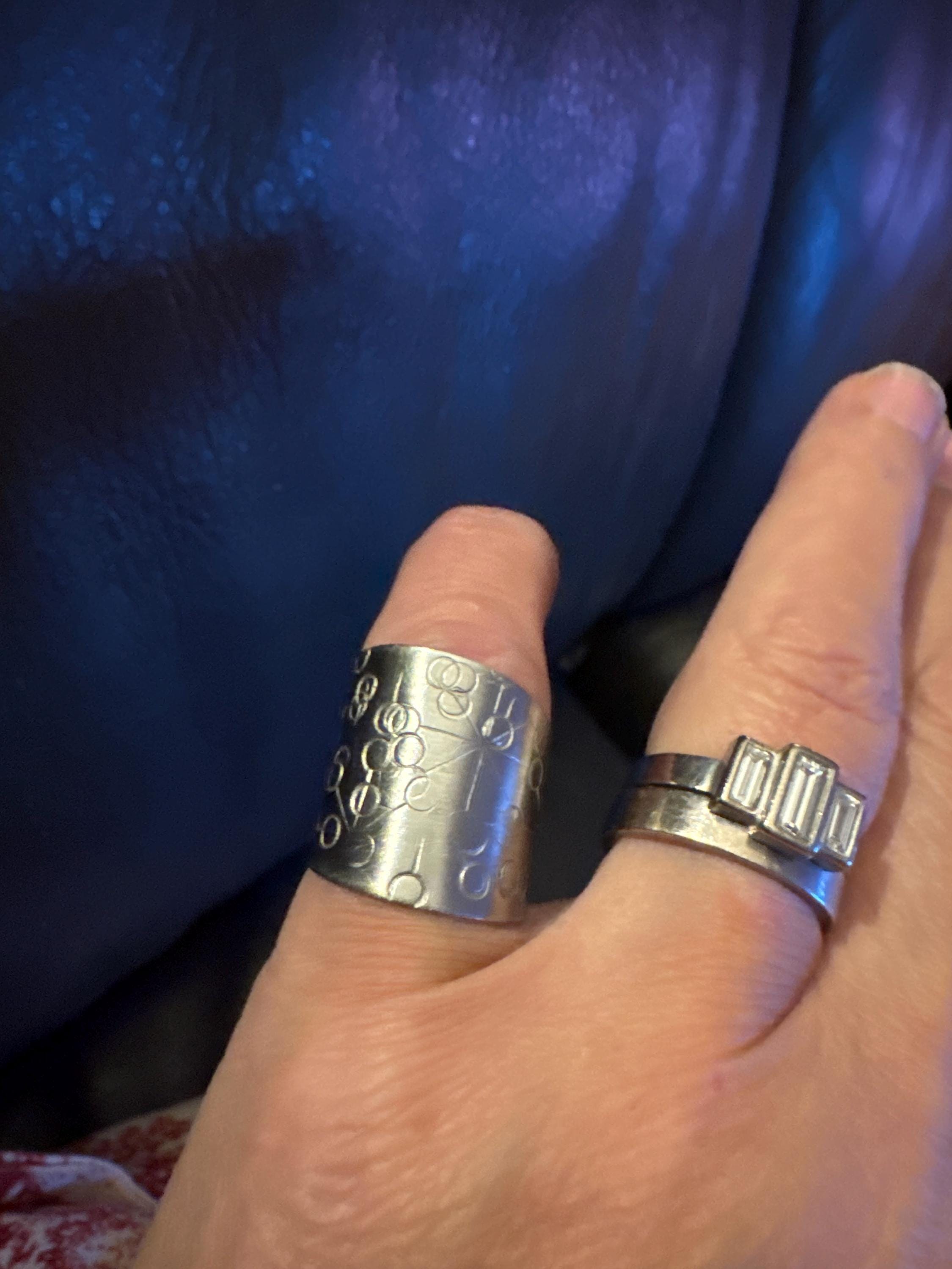 1970s stainless steel adjustable ring, with futuristic etch pattern