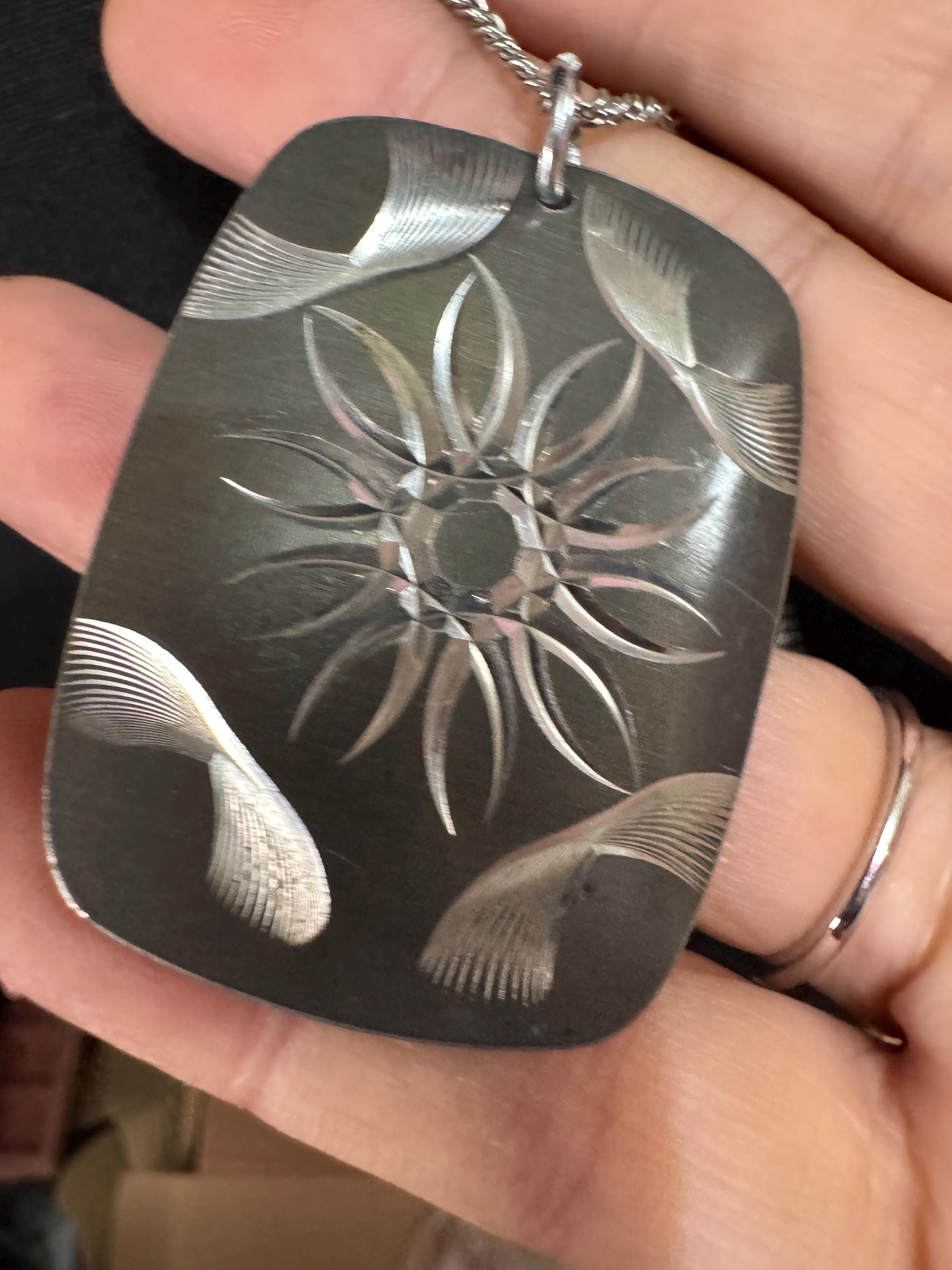 Vintage 1970s stainless steel etched pendant on a 41cm chain