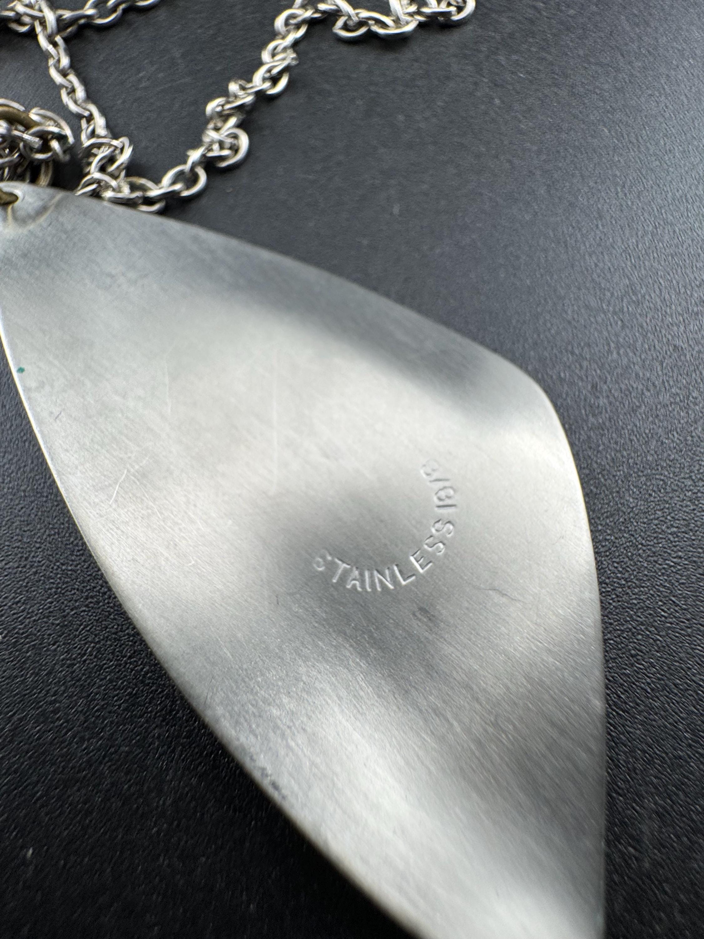 Vintage 1970s stainless steel abalone shell pendant on a 70cm chain