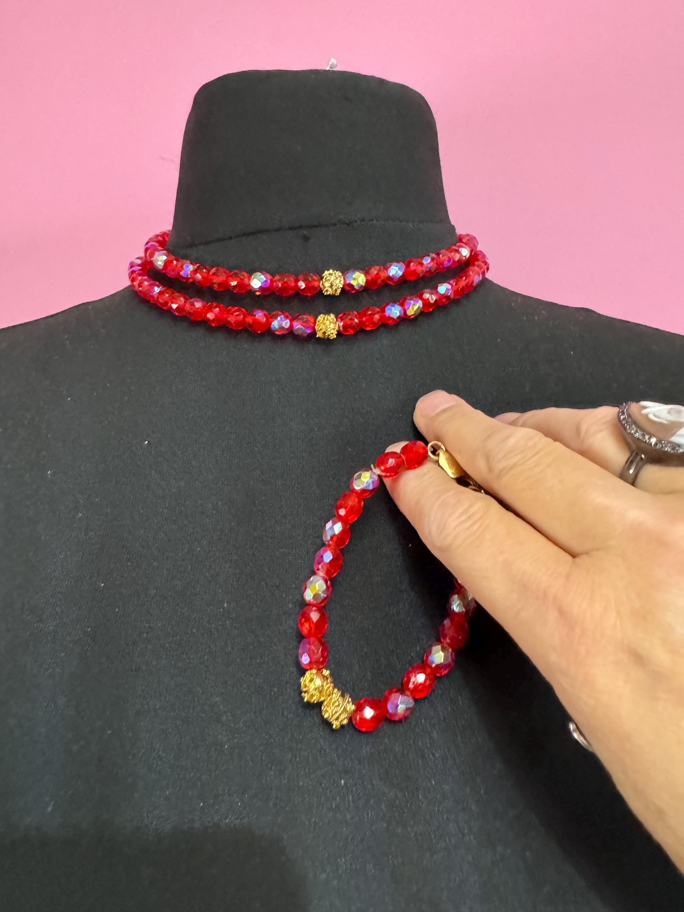 Red glass beaded crystal Multistrand necklace and matching bracelet, faceted beads gold tone