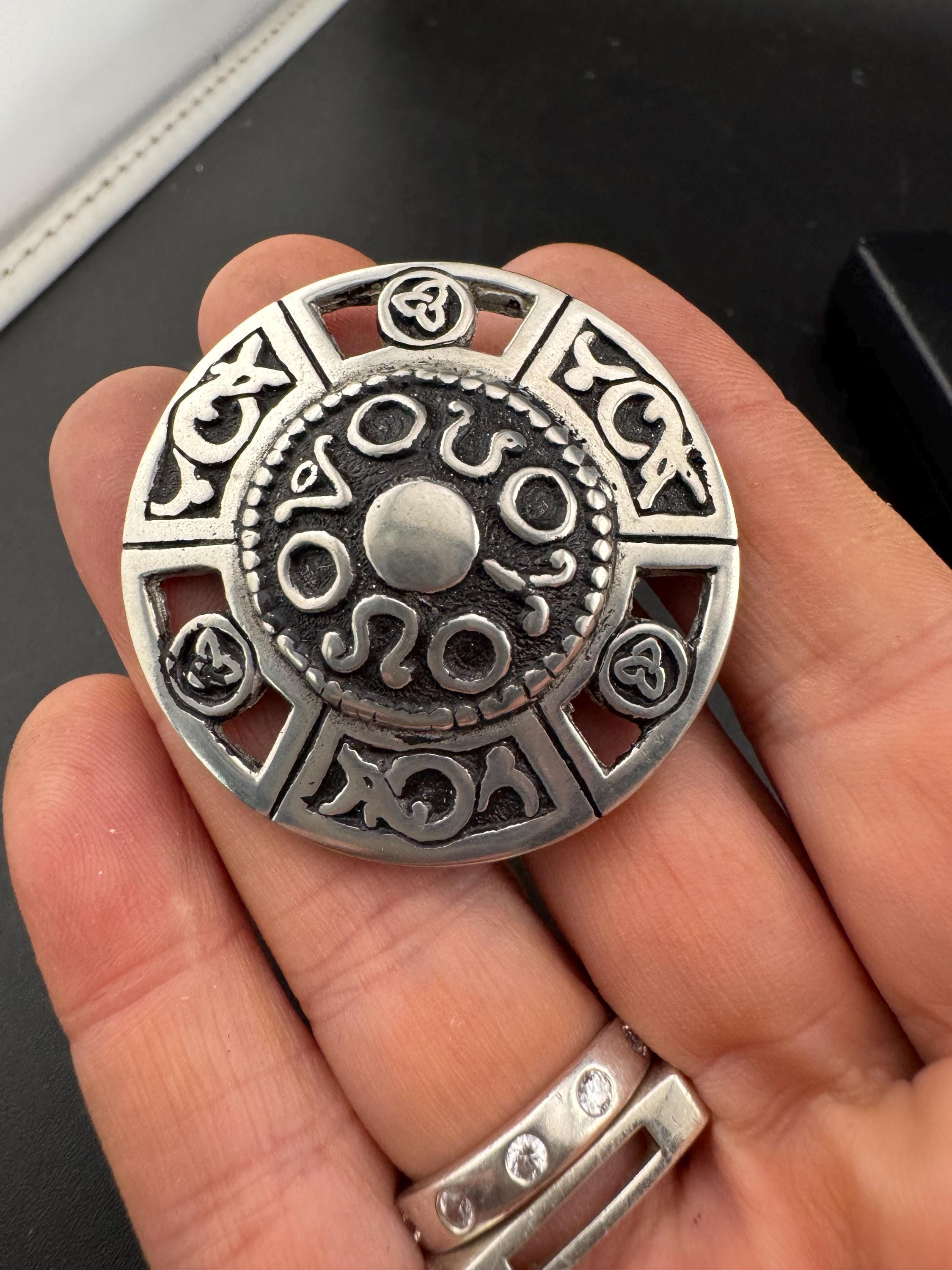 St Justin Celtic Brooch, boxed In pewter and signed silver tone domed