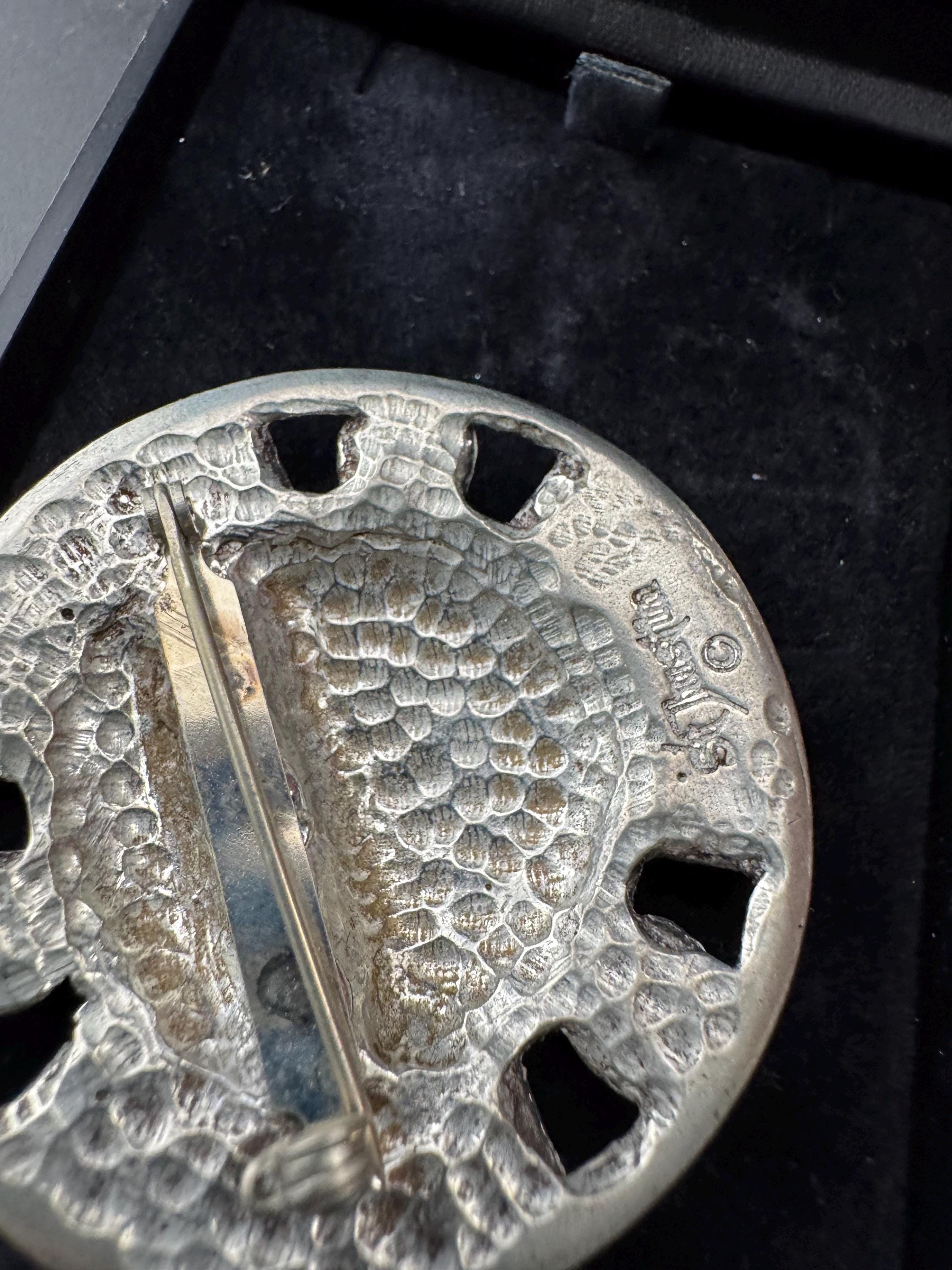 St Justin Celtic Brooch, boxed In pewter and signed silver tone domed