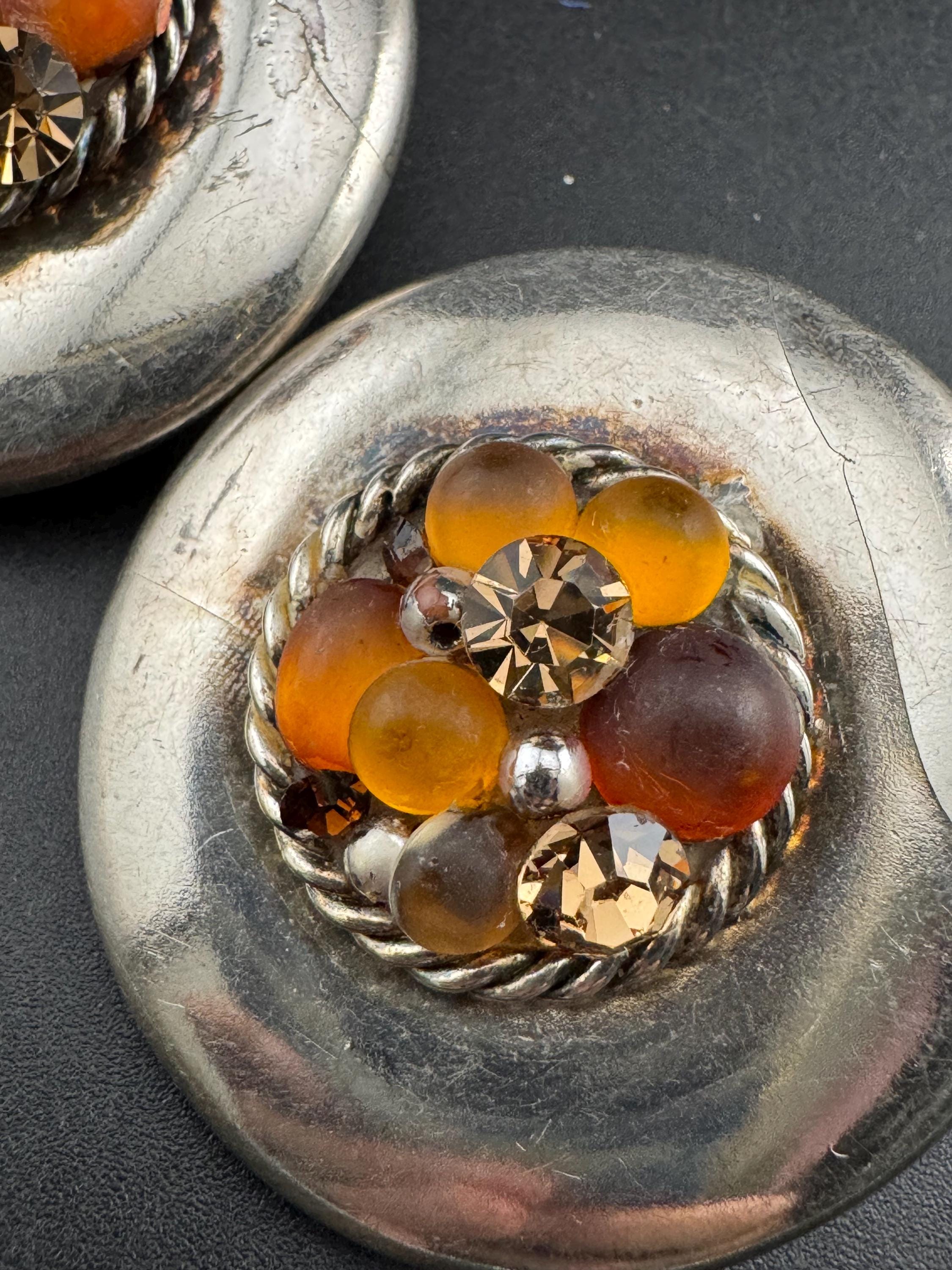 Jacky de G Oversized silver domed Clip On Earrings: designer orange stones