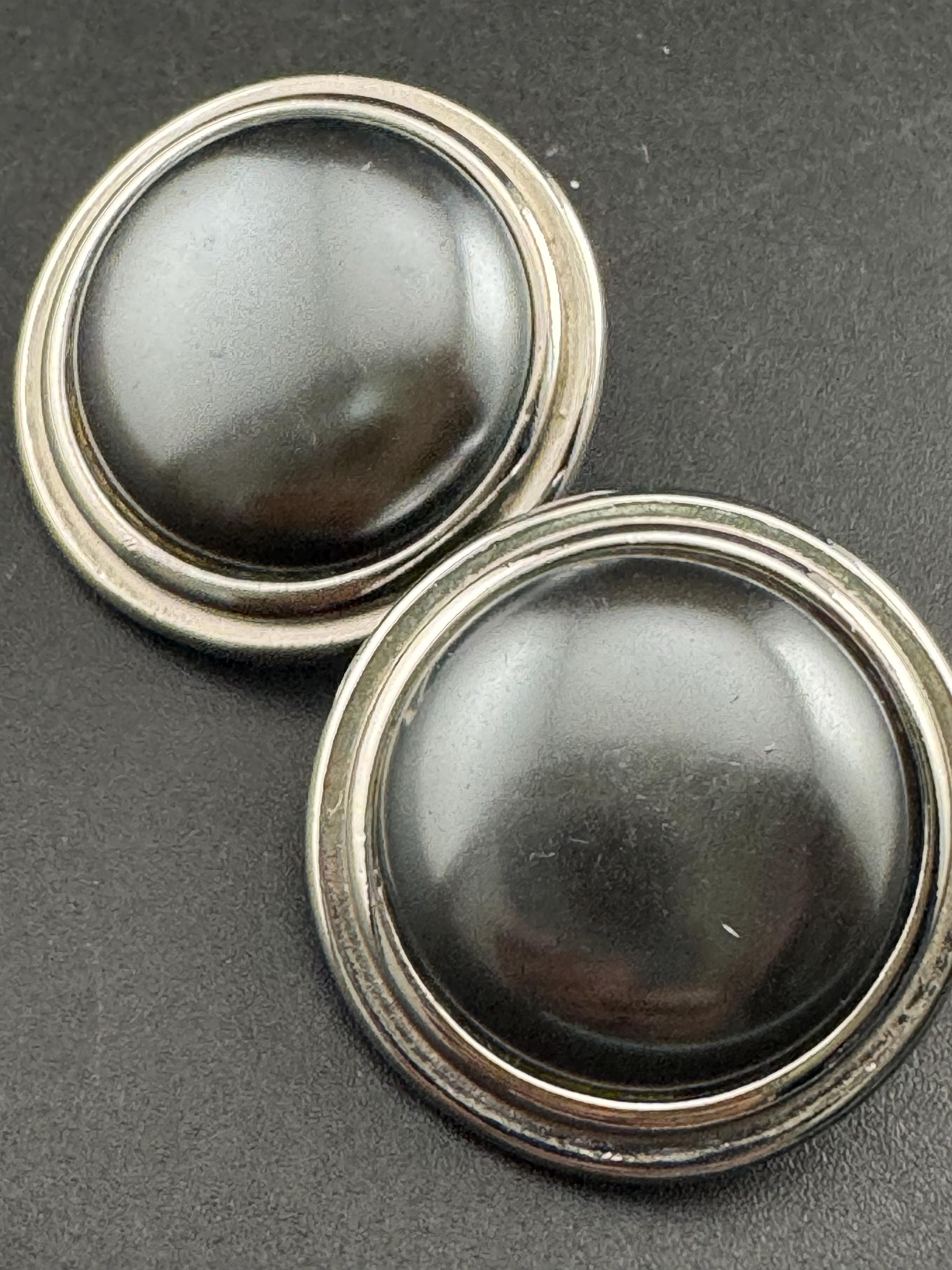Signed YSL grey domed Clip On Earrings: 4cm silver by yves Saint Laurent