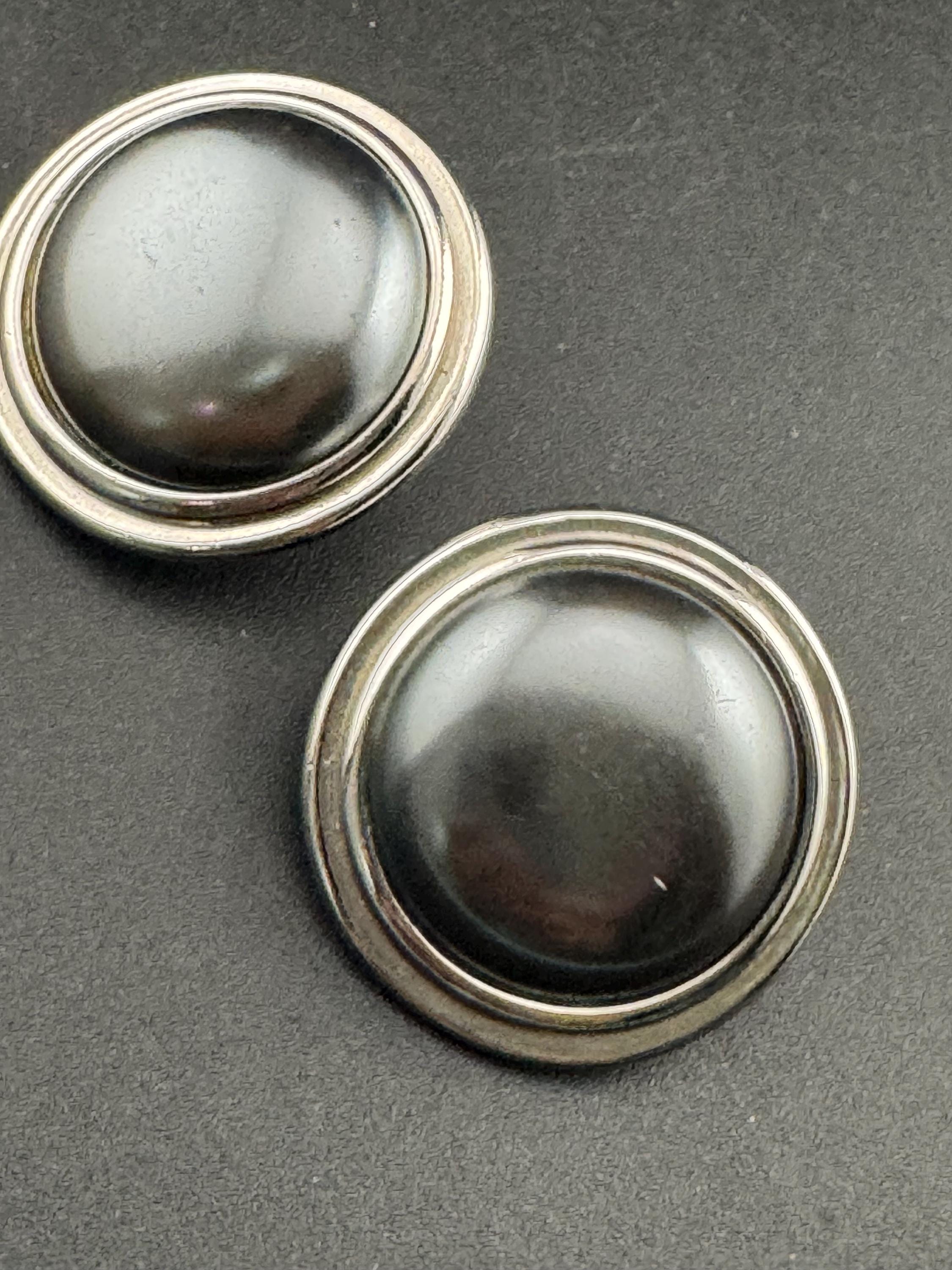 Signed YSL grey domed Clip On Earrings: 4cm silver by yves Saint Laurent