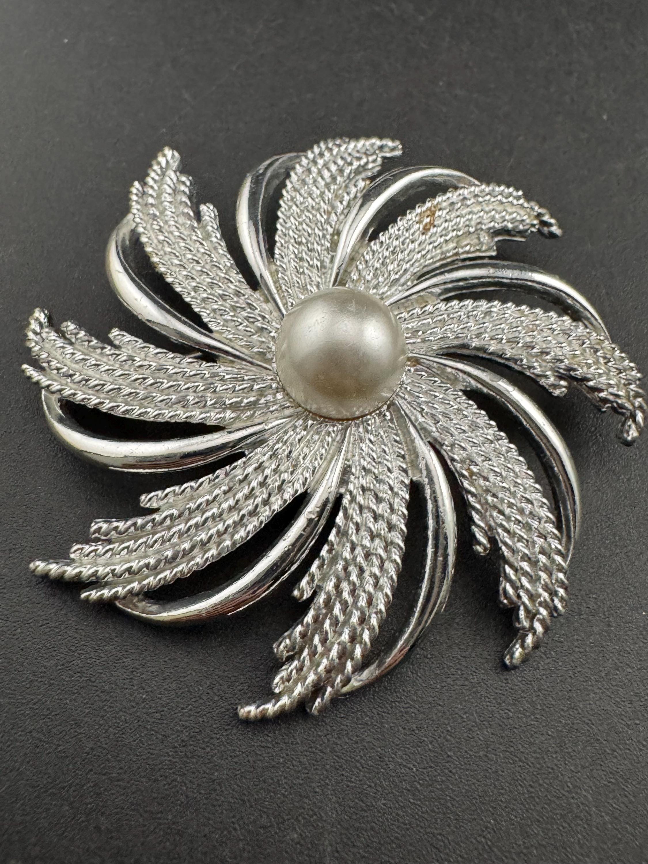vintage large Sarah Coventry pinwheel brooch, silver tone with central pearl