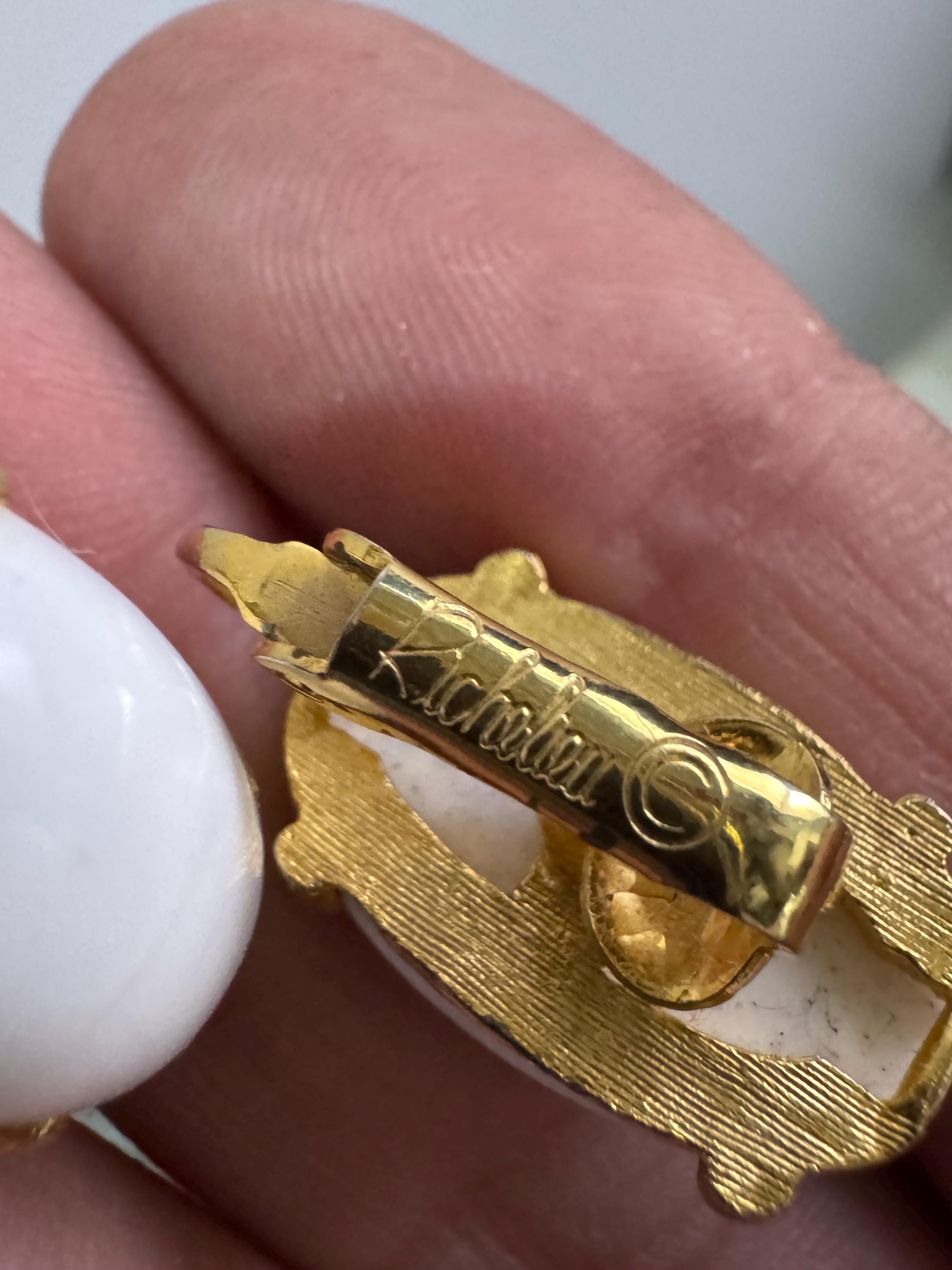 Signed RICHELIEU Vintage white oval clip on earrings, signed