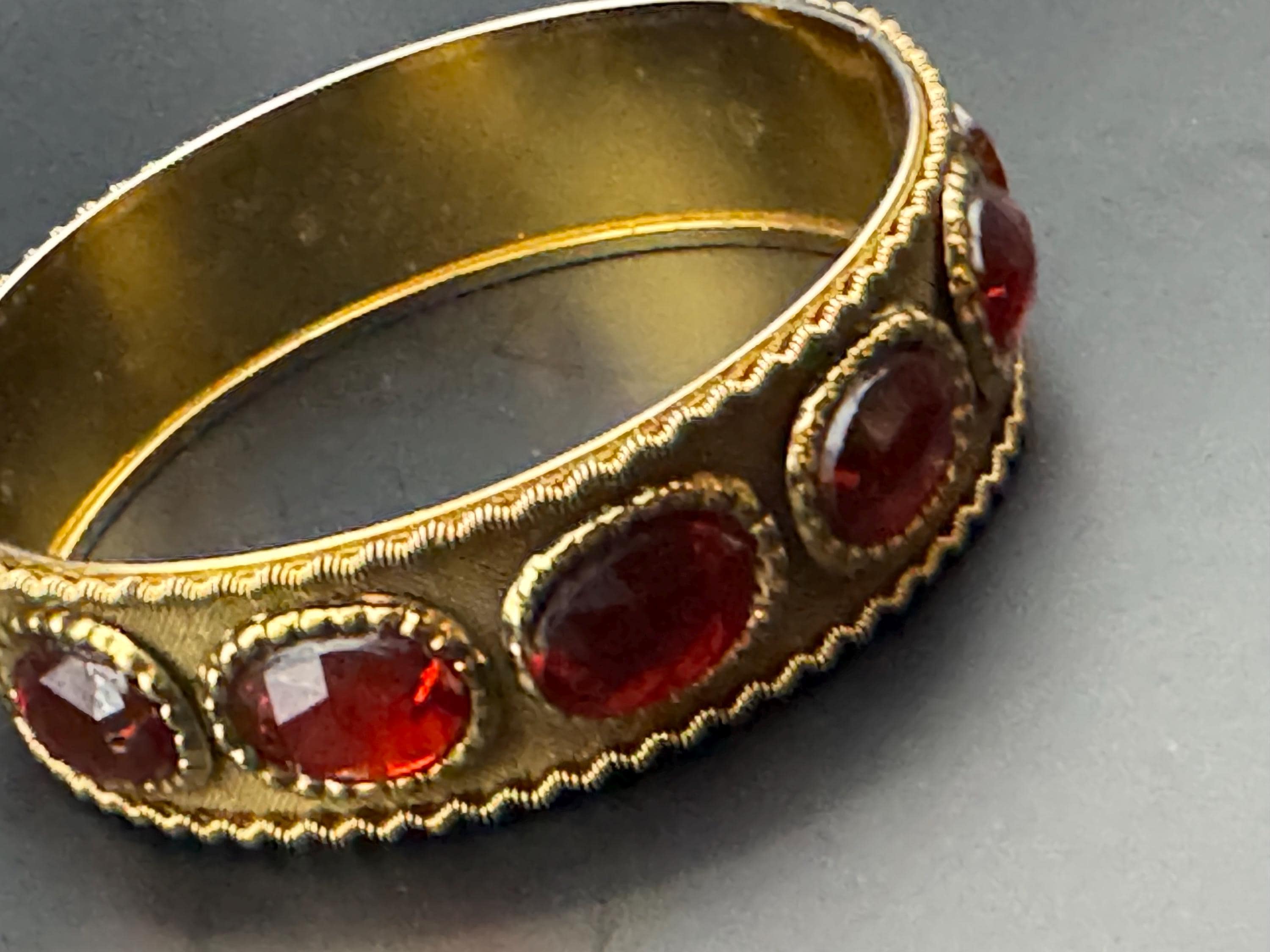 Vintage gold metal ruby cabochon wide fixed Bangle. Etruscan medieval style