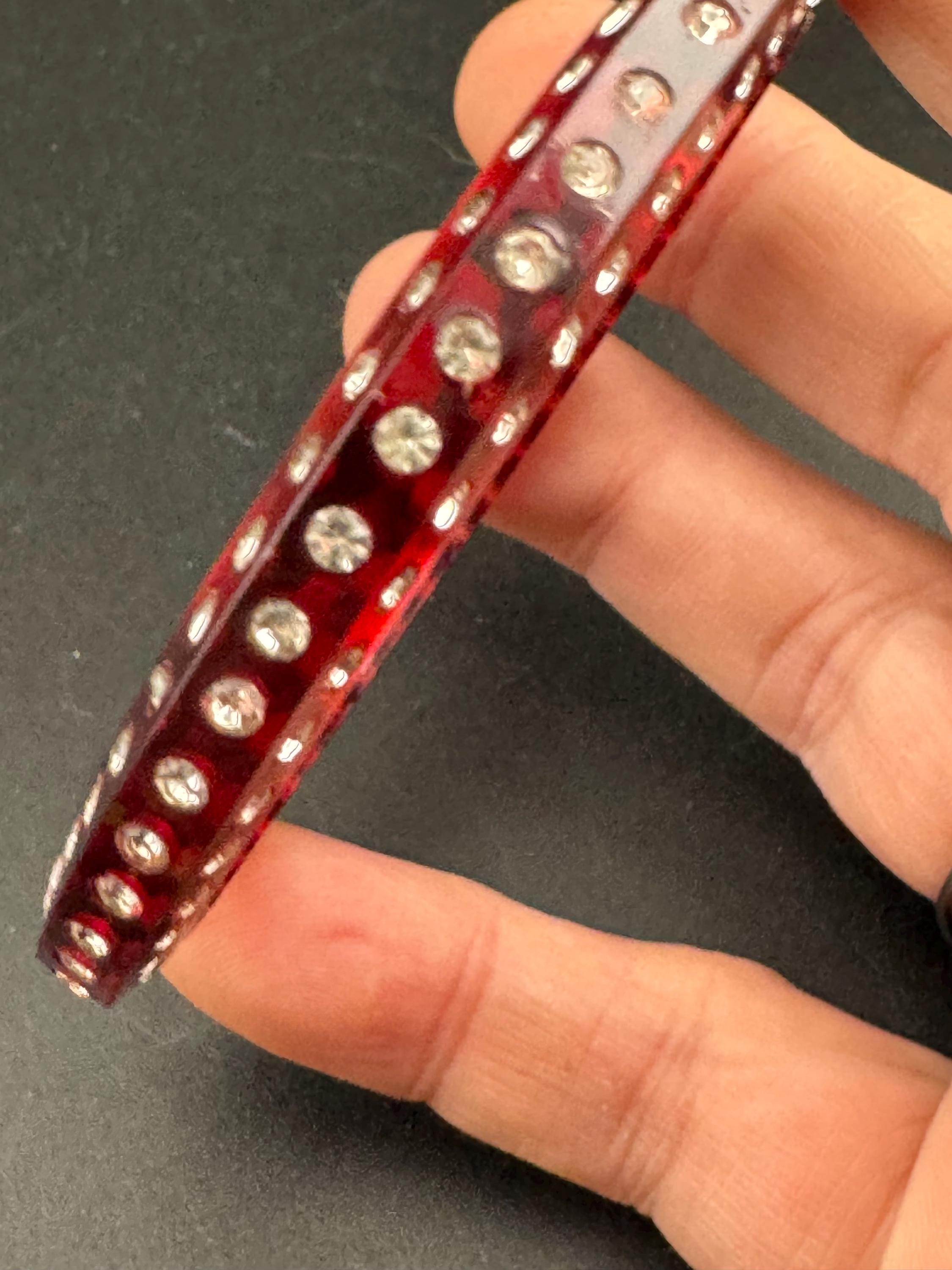 Art Deco early root beer red plastic sparkly paste bangle.