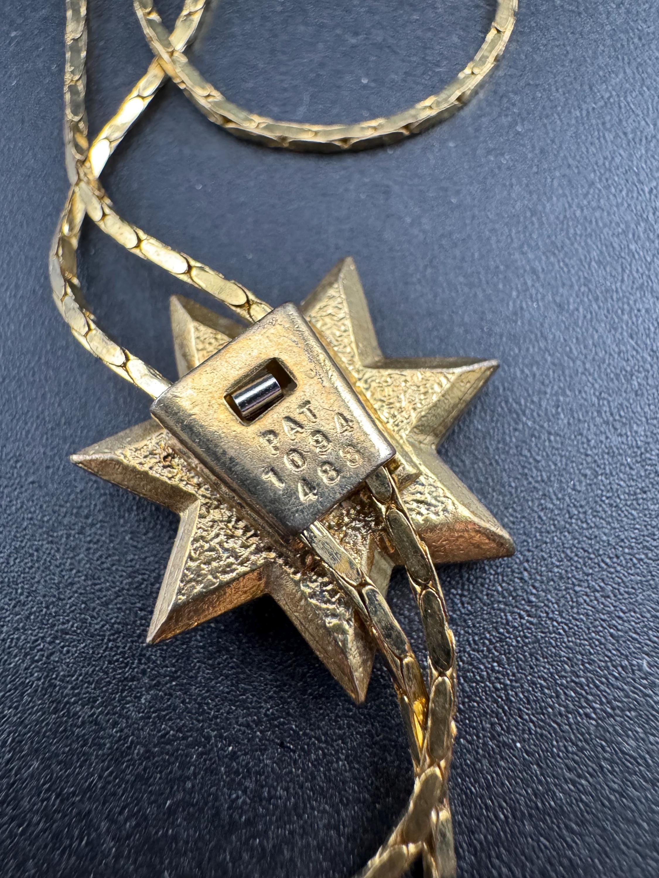 Vintage star crystal slider bolo necklace, with pat no , gold plated