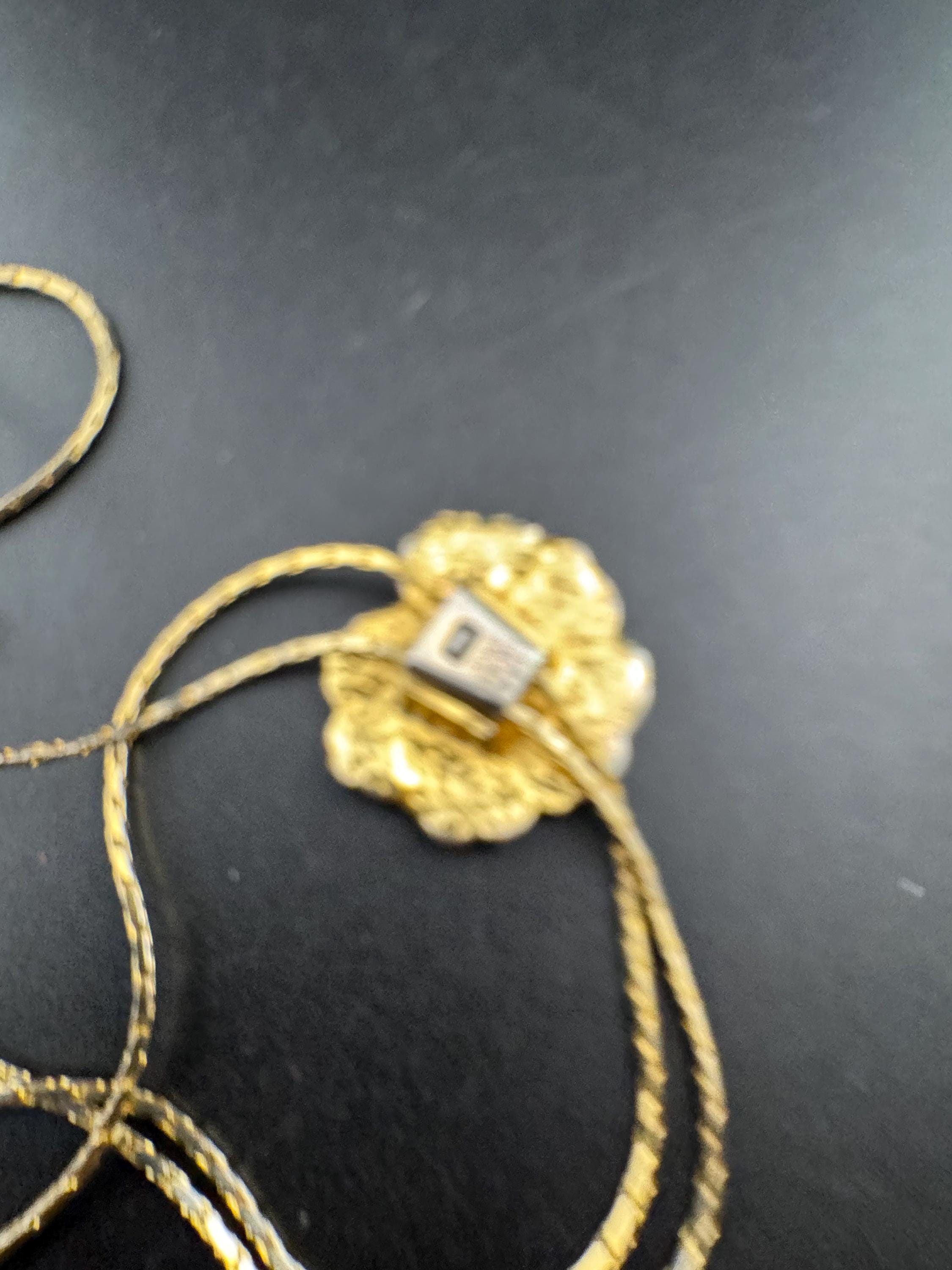 Vintage black enamel and crystal floral slider bolo necklace, with pat no , gold plated