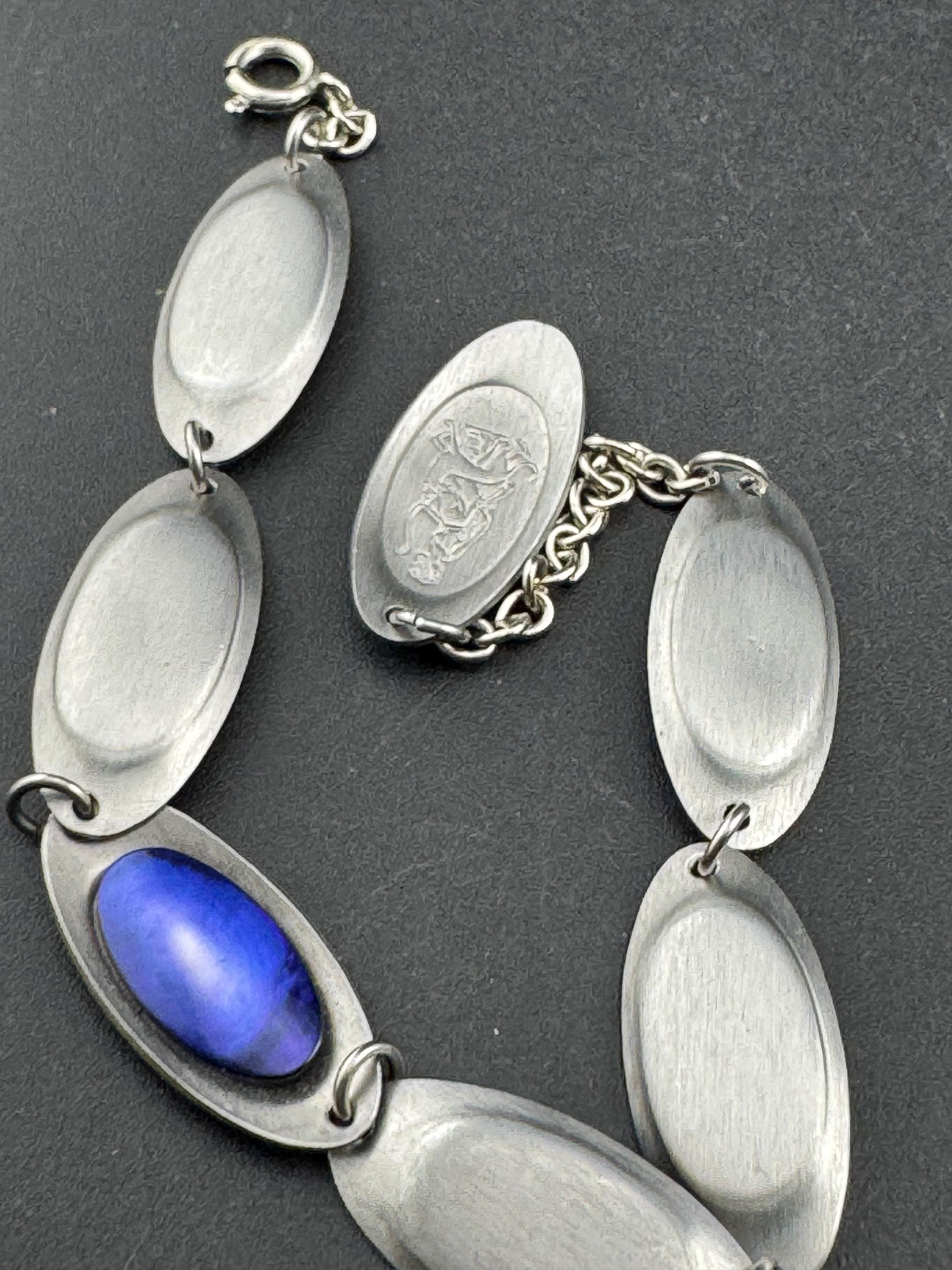 Vintage 1970s stainless steel bracelet , purple shell cabochons