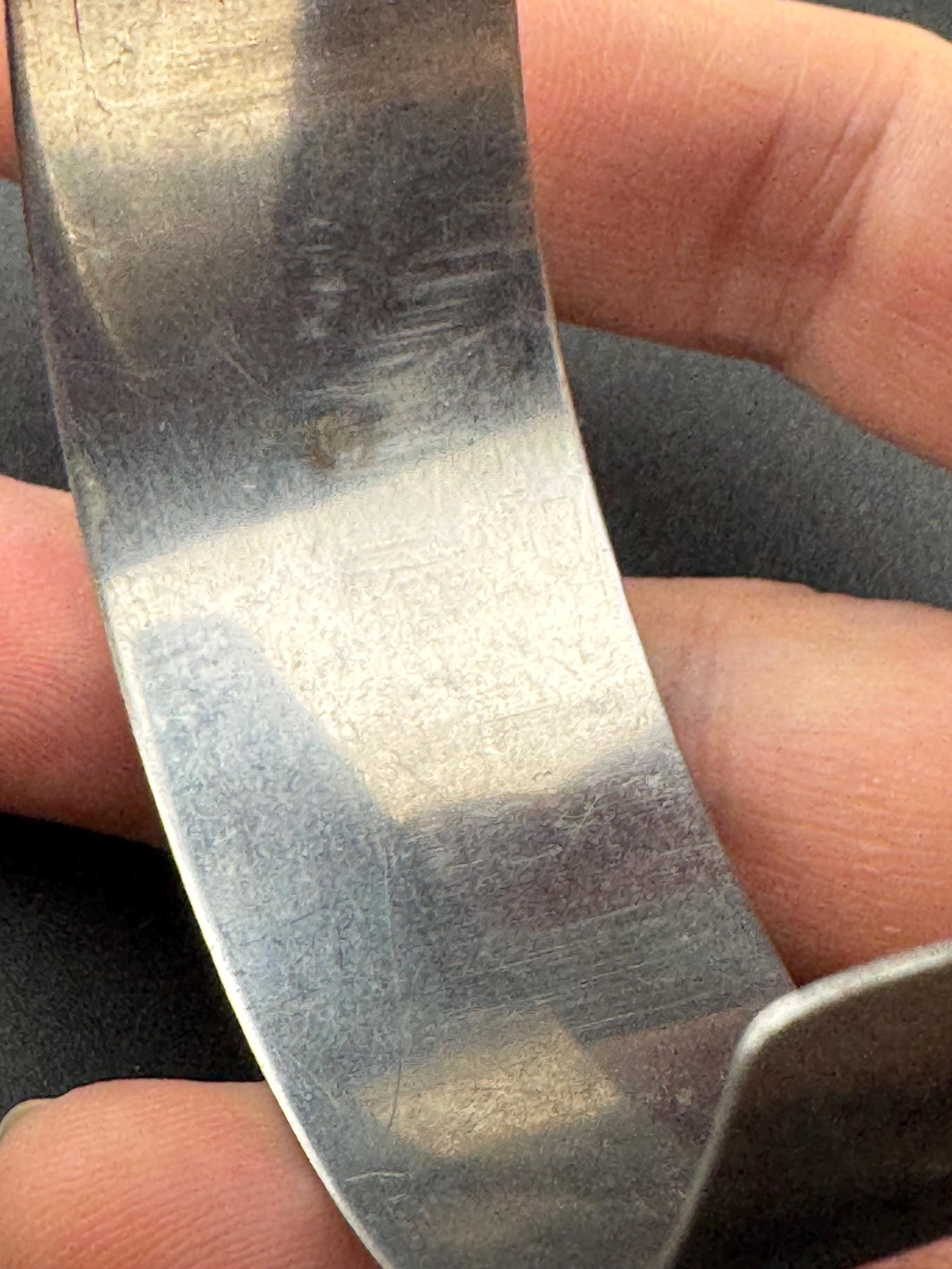 1970s stainless steel wide bangle, set with orange agate genstone