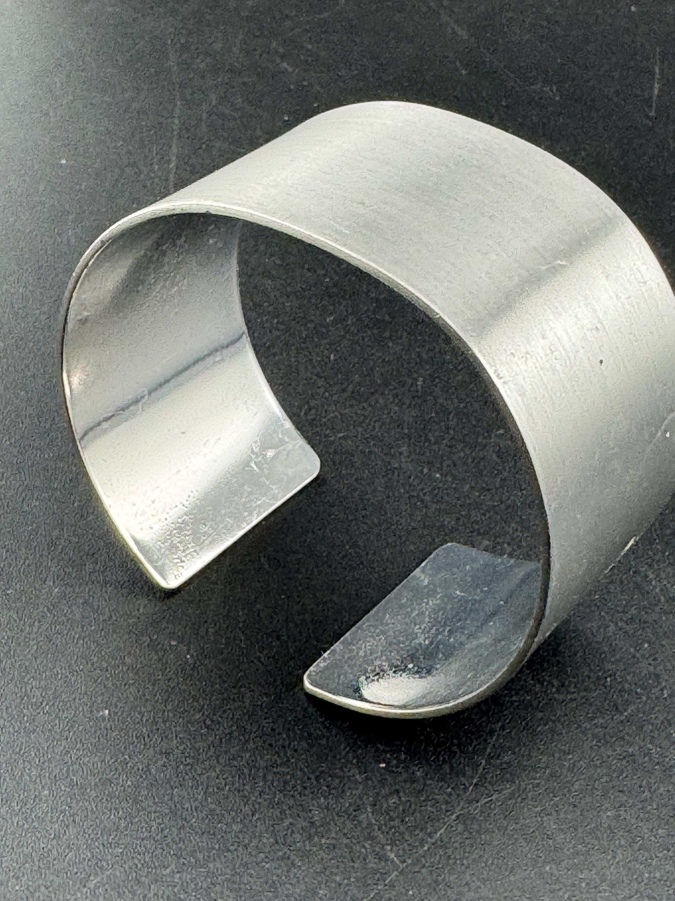 Wide stainless steel modernist bangle, 1970s modernist