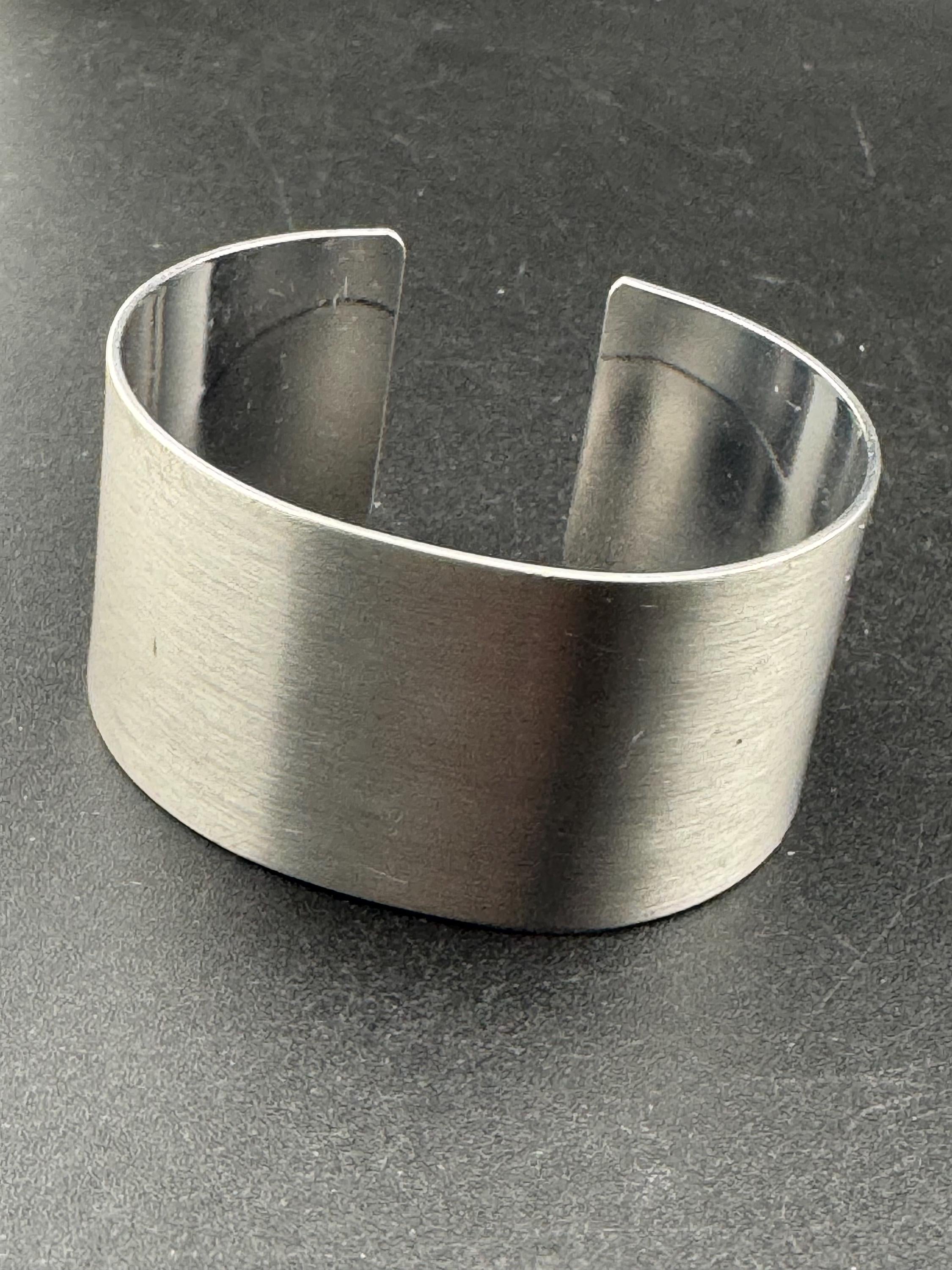 Wide stainless steel modernist bangle, 1970s modernist