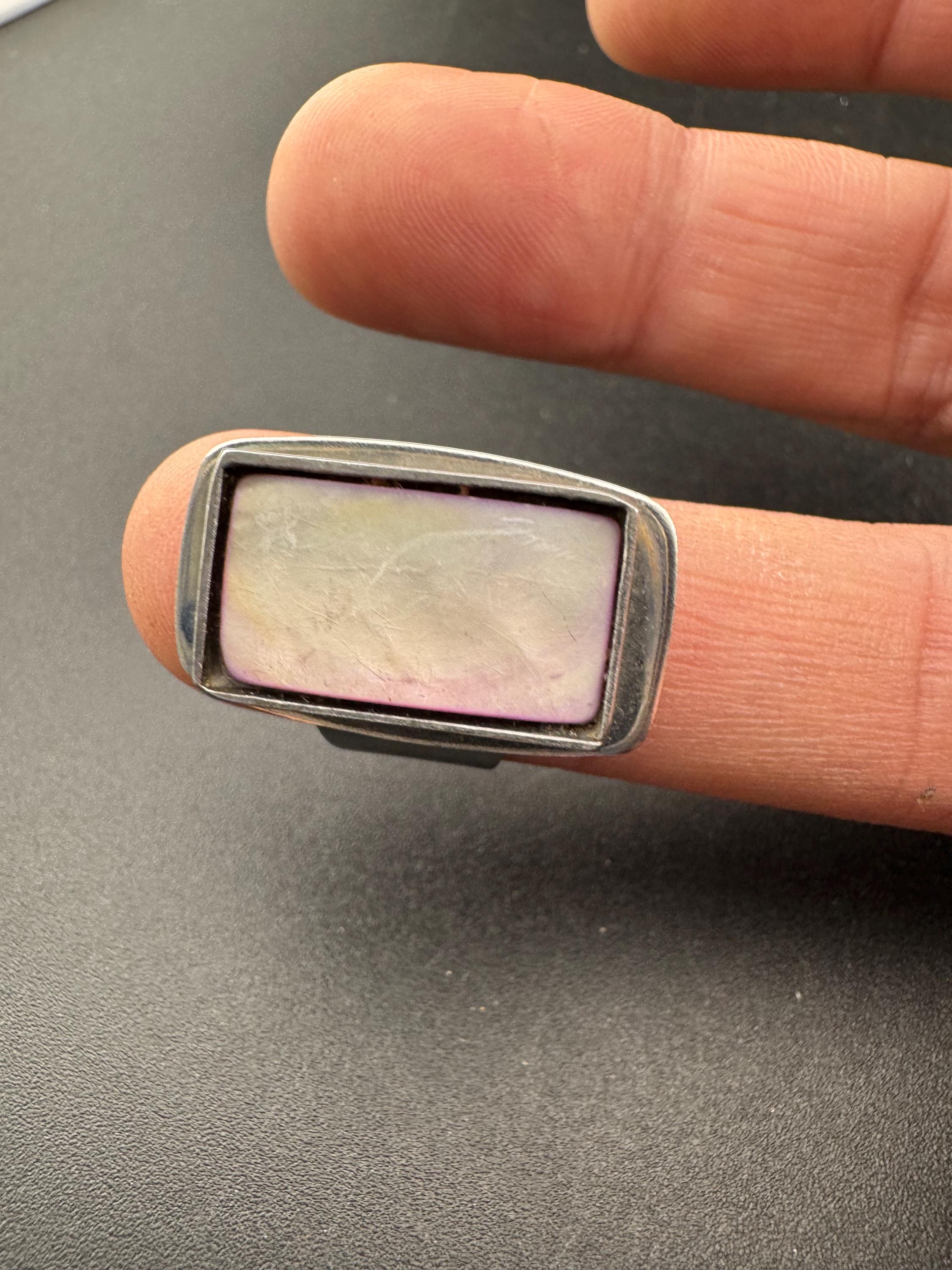 1970s Lord python stainless steel adjustable ring, set with pink shell cabochon, vintage