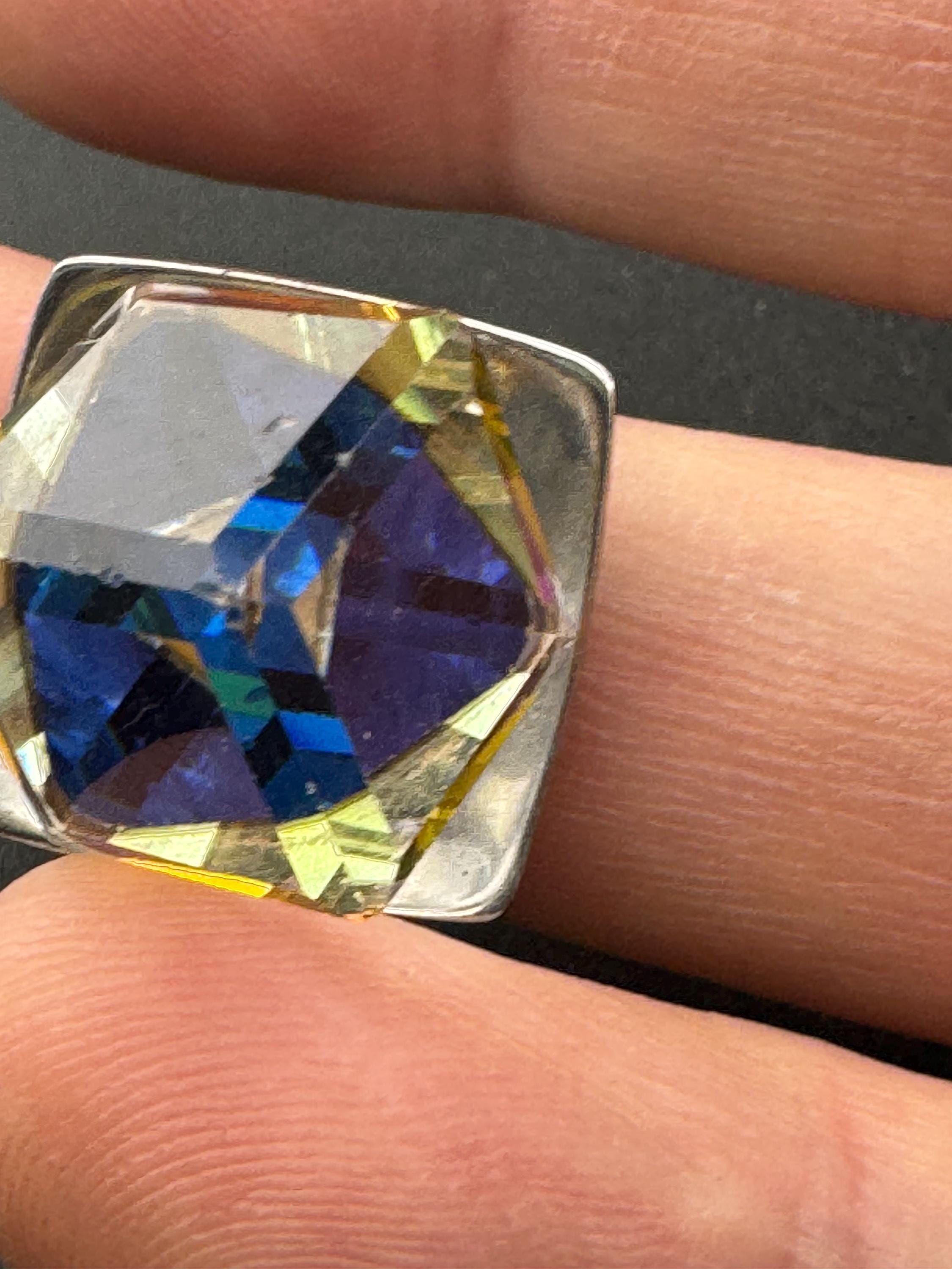 1970s stainless steel adjustable ring, set with rainbow cube glass cabochon, vintage