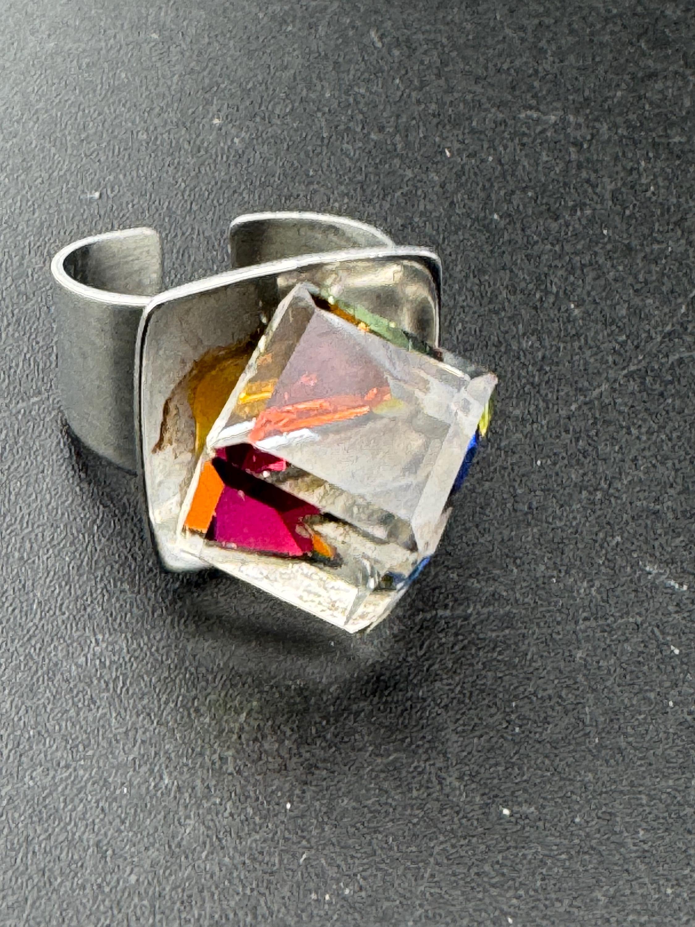 1970s stainless steel adjustable ring, set with rainbow cube glass cabochon, vintage