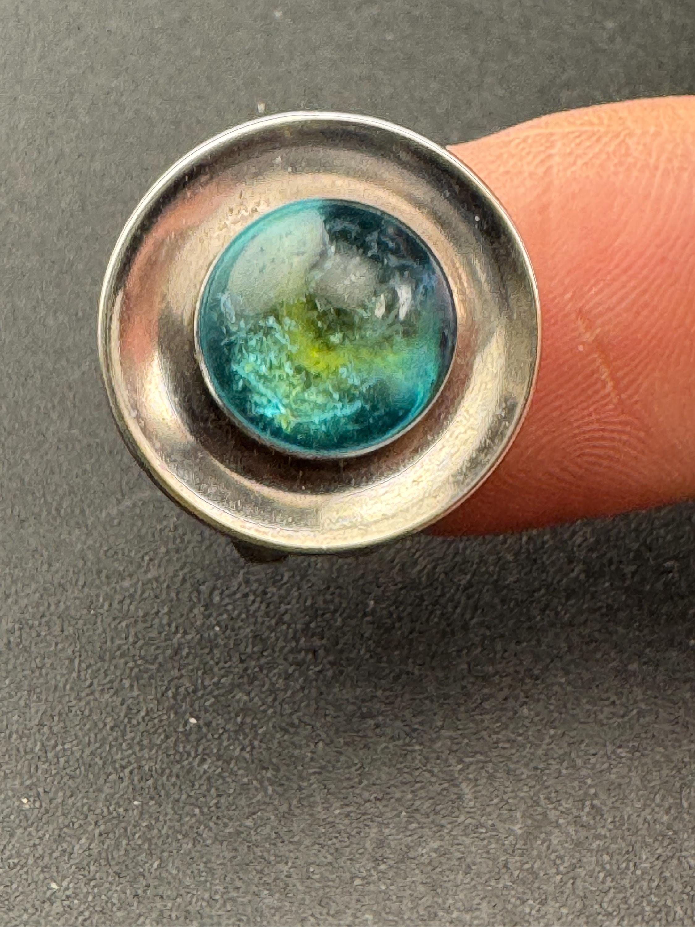 1970s stainless steel adjustable ring, set with blue glass ball cabochon