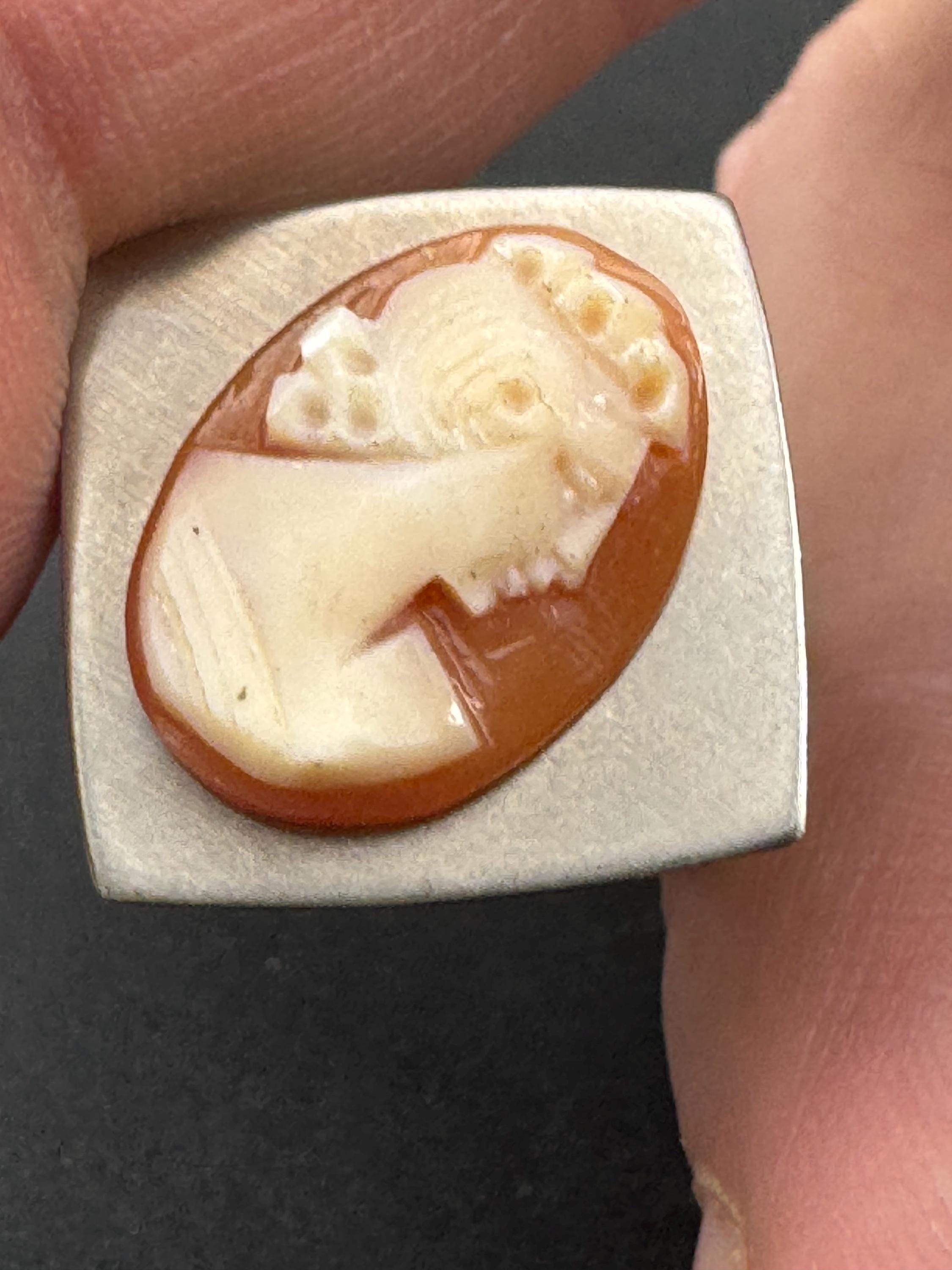 1970s stainless steel adjustable ring, with carved shell cameo