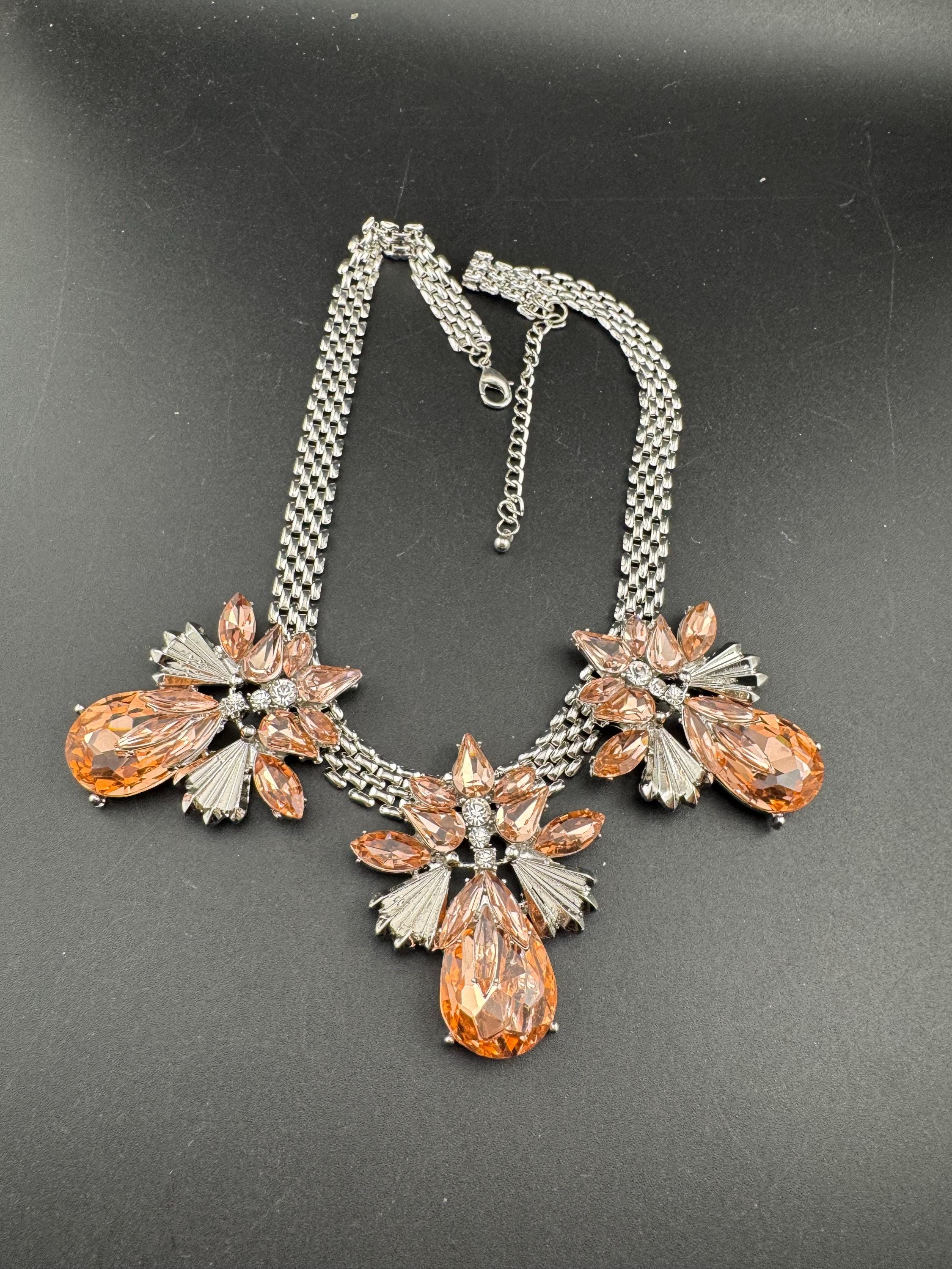 Peach rhinestone oversized panther link choker, silver tone necklace