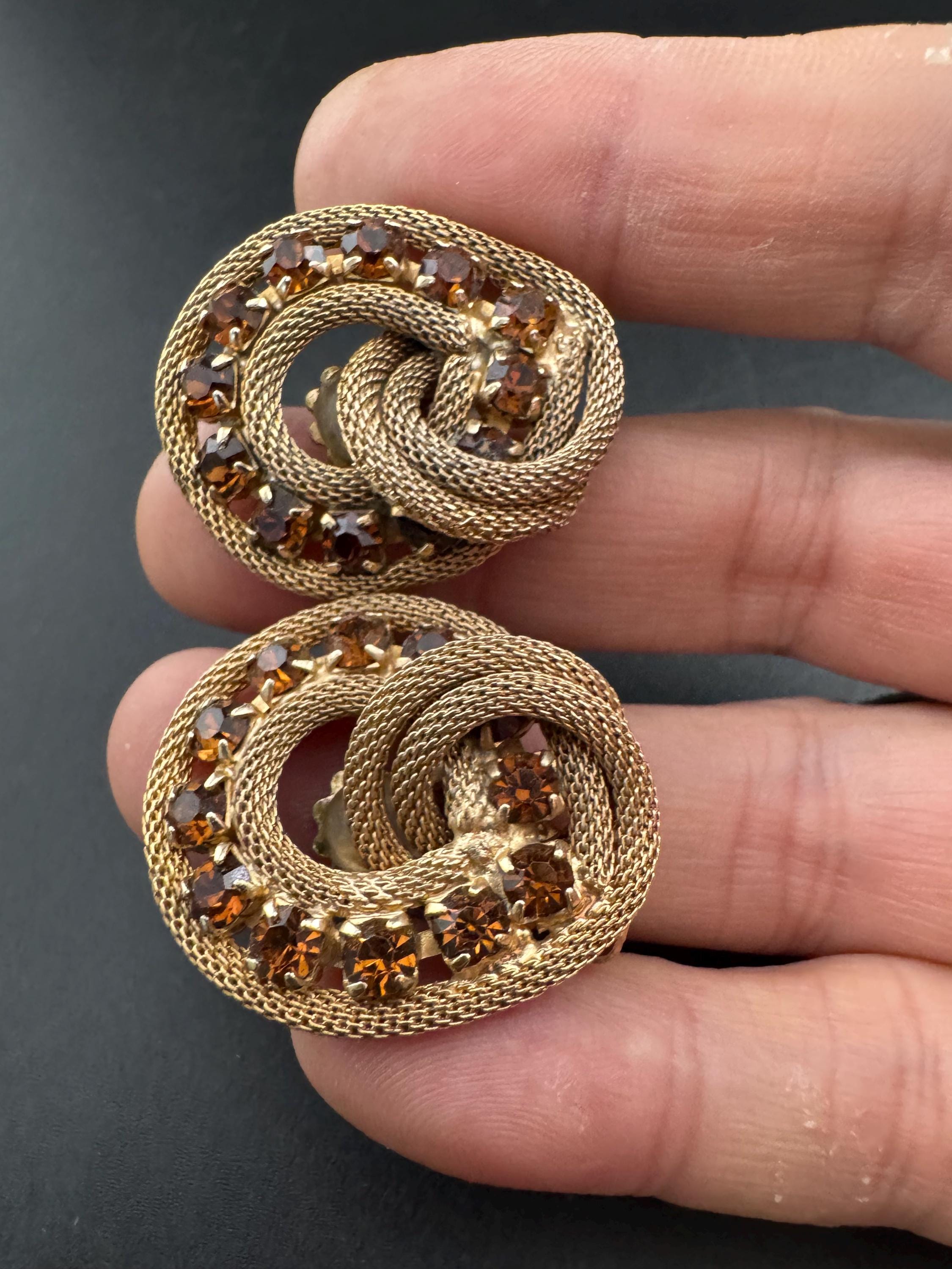 Vintage 1960s brown cognac glass gold tone round mesh clip On Earrings