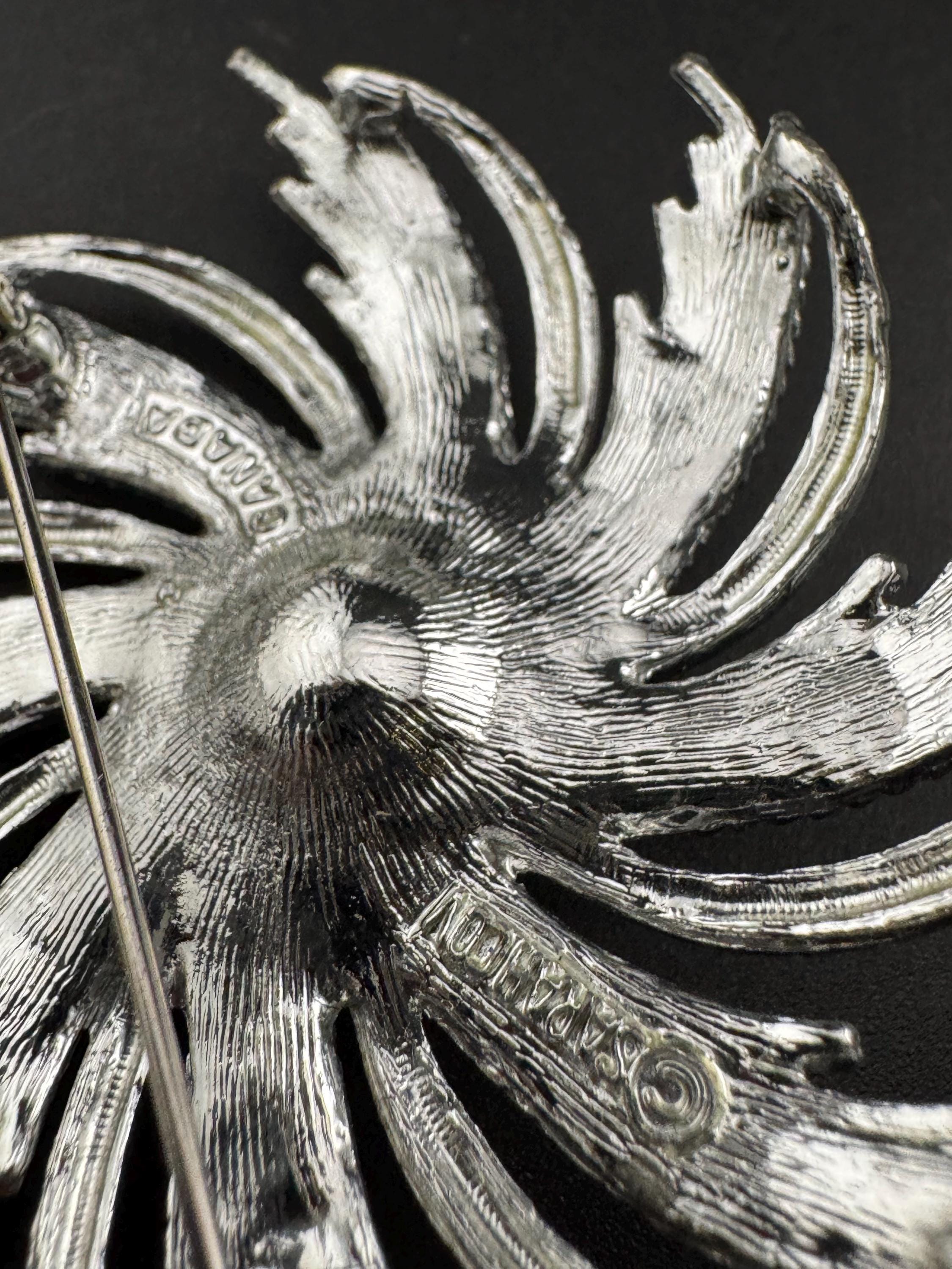 vintage large Sarah Coventry pinwheel brooch, silver tone with central pearl