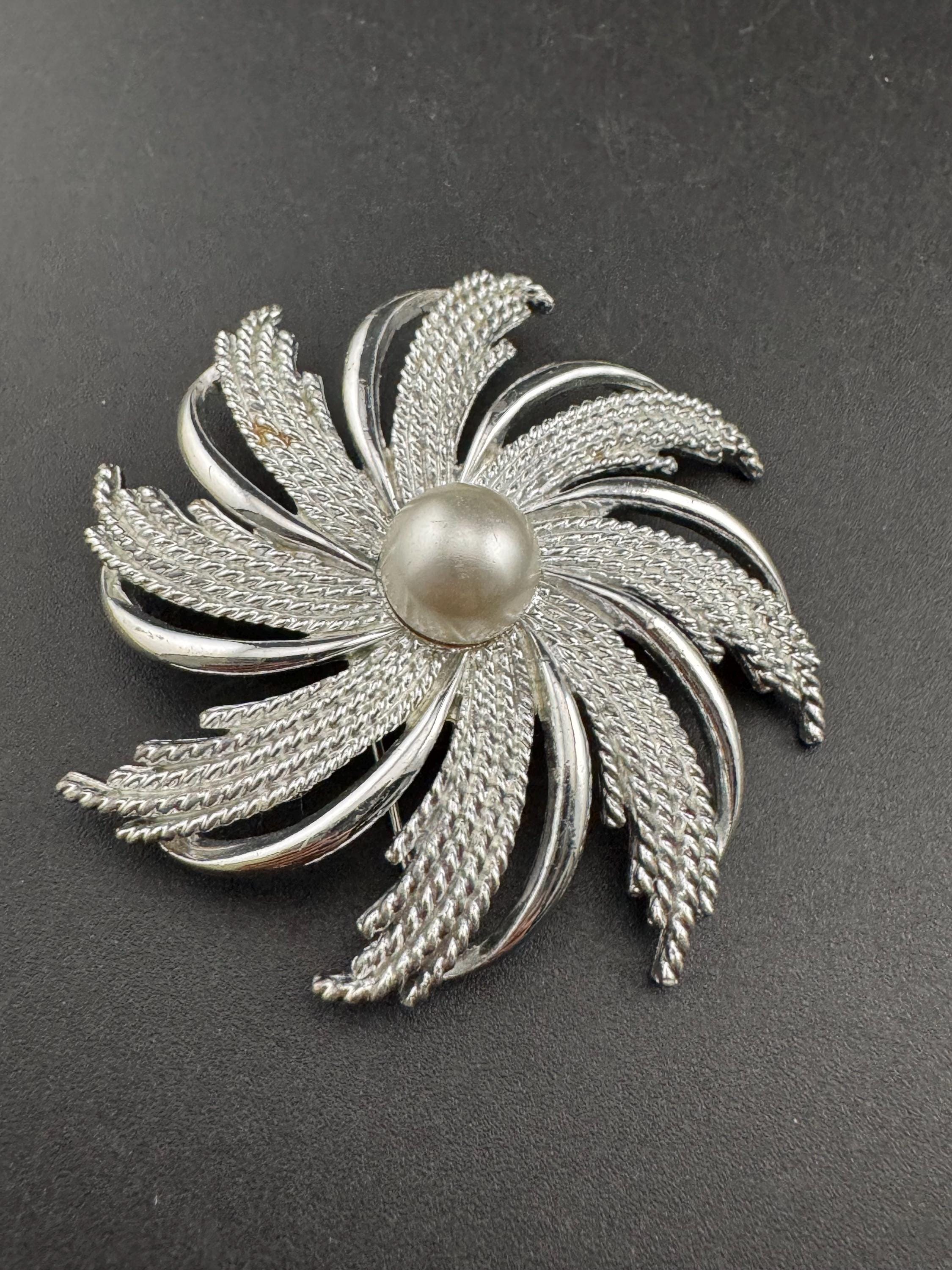 vintage large Sarah Coventry pinwheel brooch, silver tone with central pearl
