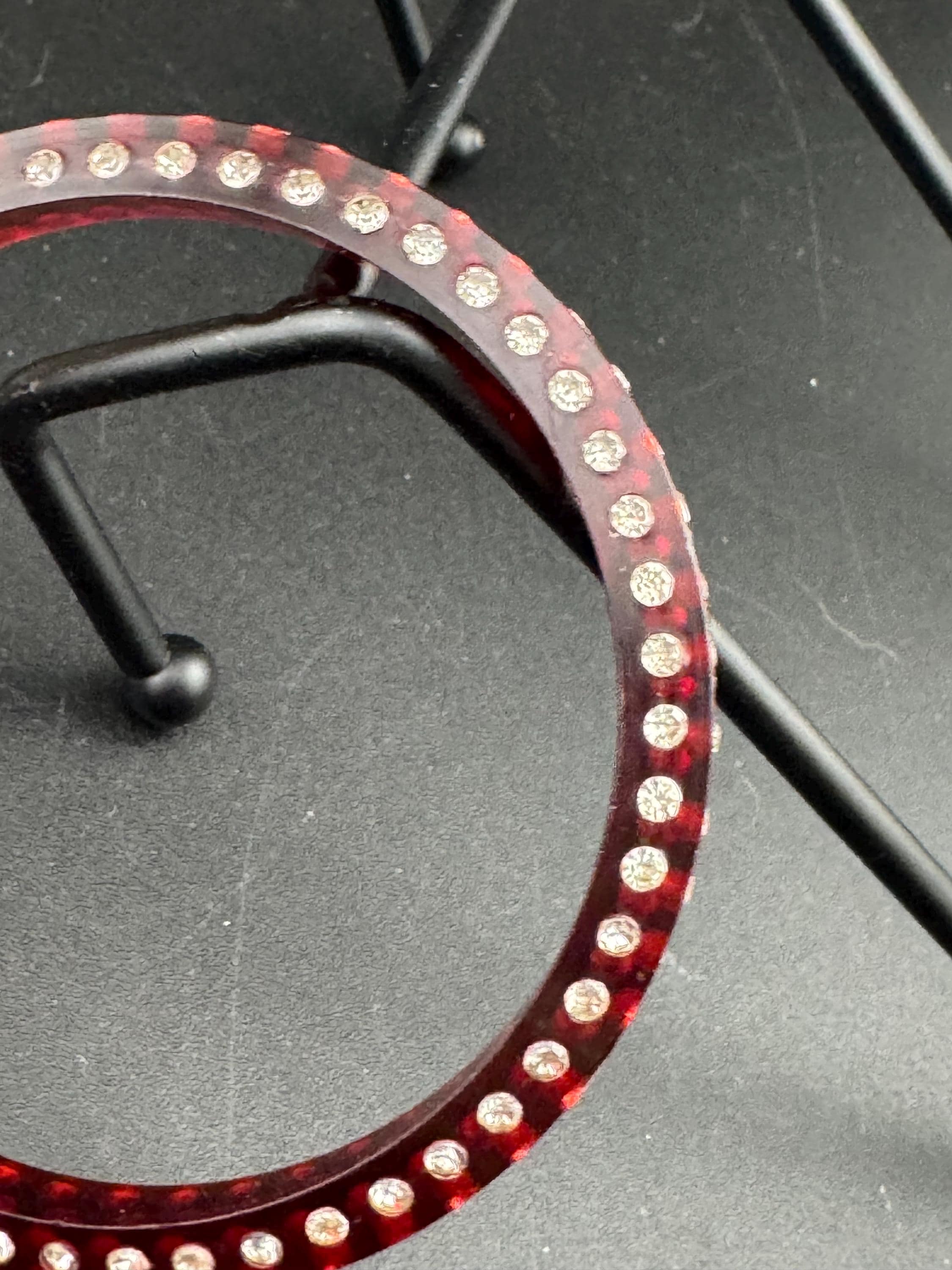 Art Deco early root beer red plastic sparkly paste bangle.