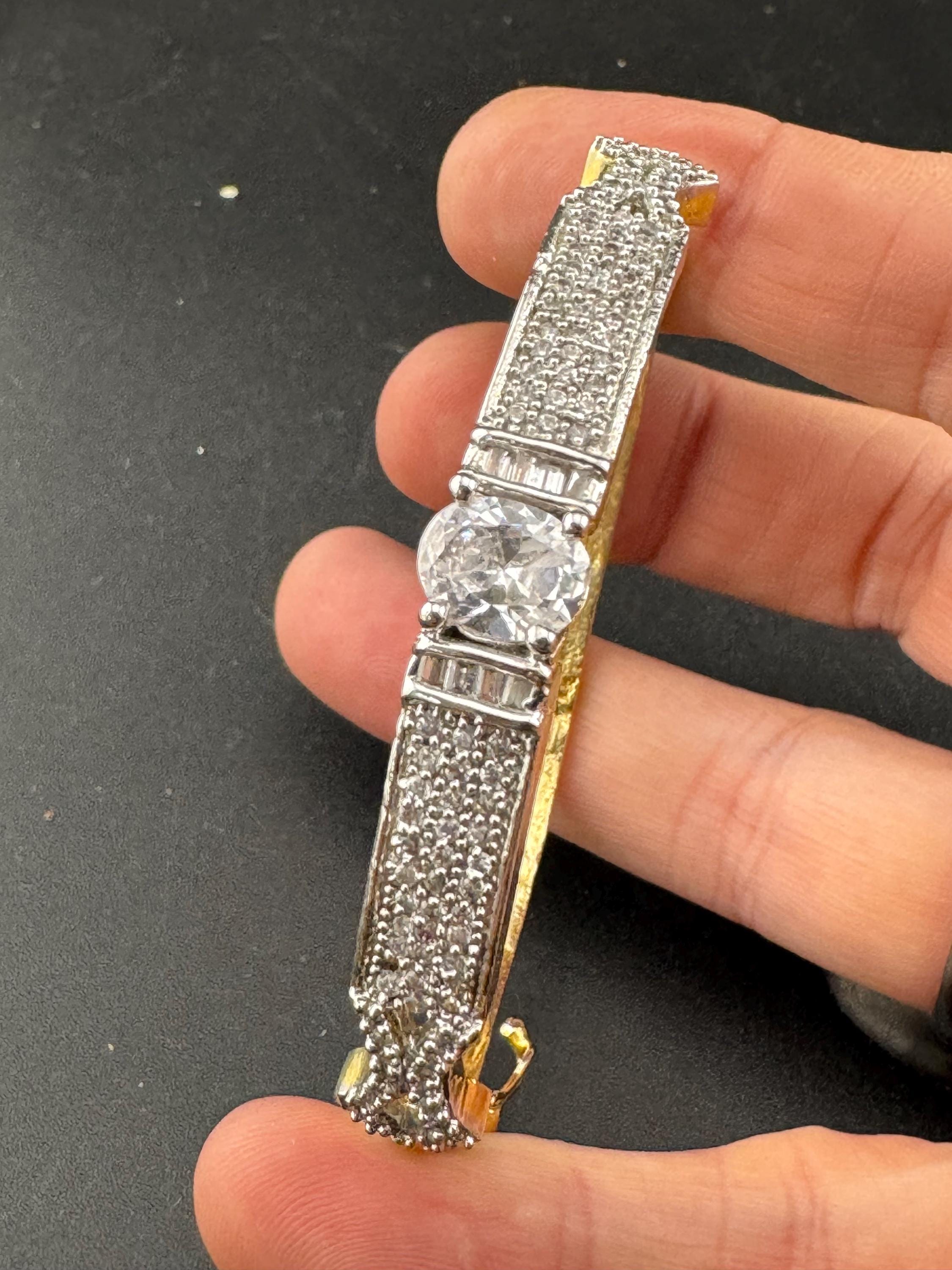 Vintage clear diamanté hinged pave set crystal bangle, gold plated