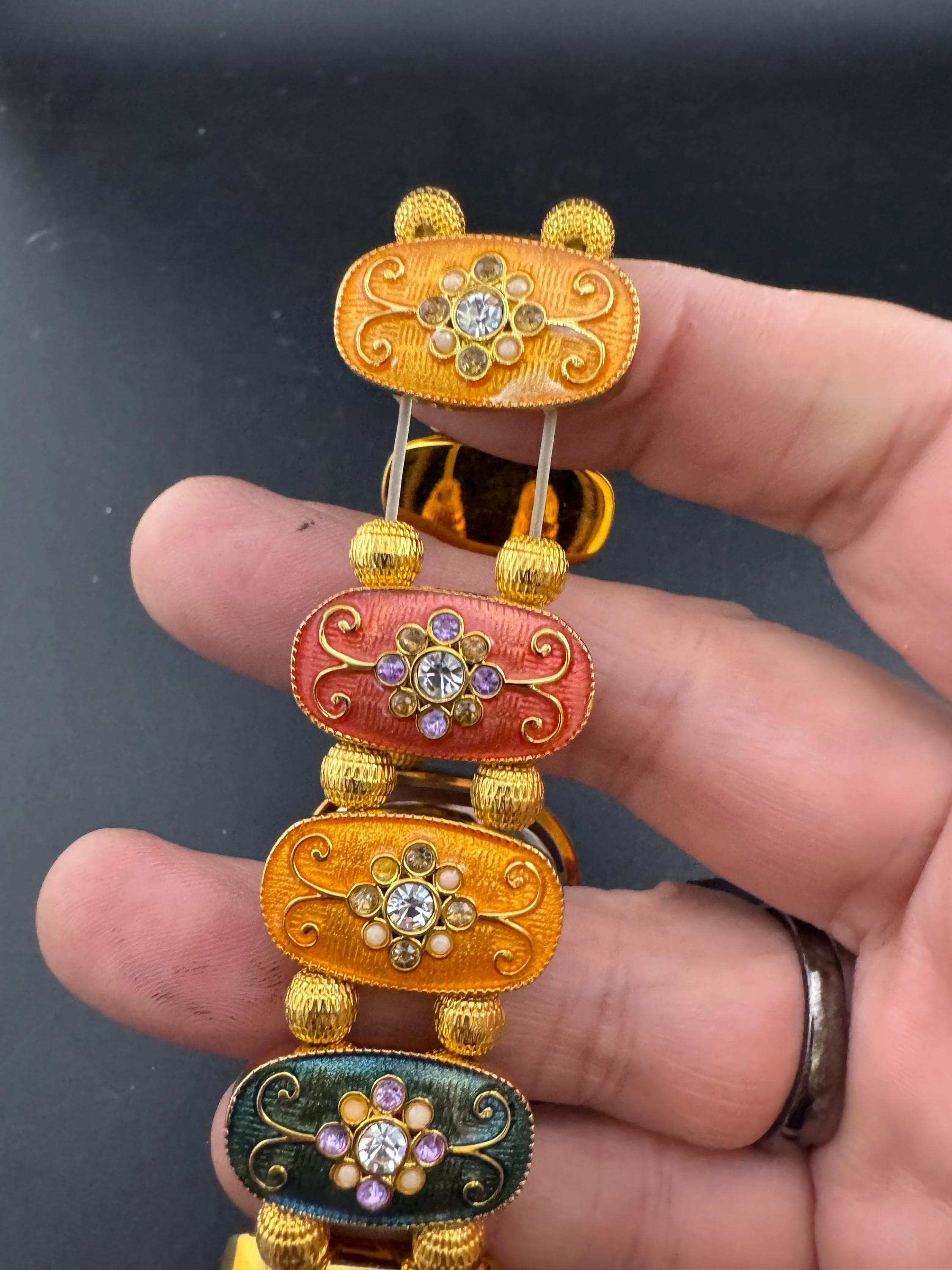 Signed Joan rivers enamelled floral panel link bracelet watch, elasticated