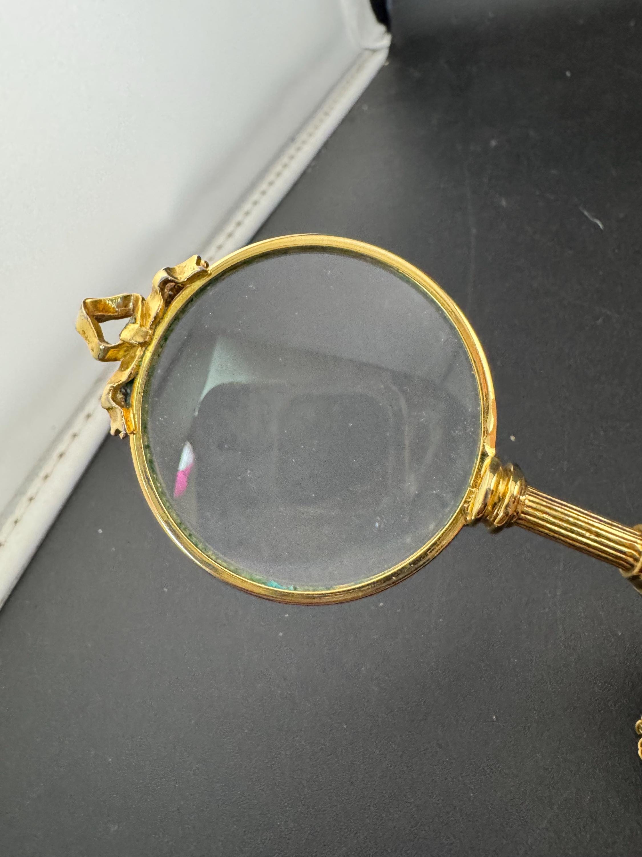 Signed Joan rivers ribbon top magnifier pendant necklace, gold plated magnifying jewellers loupe