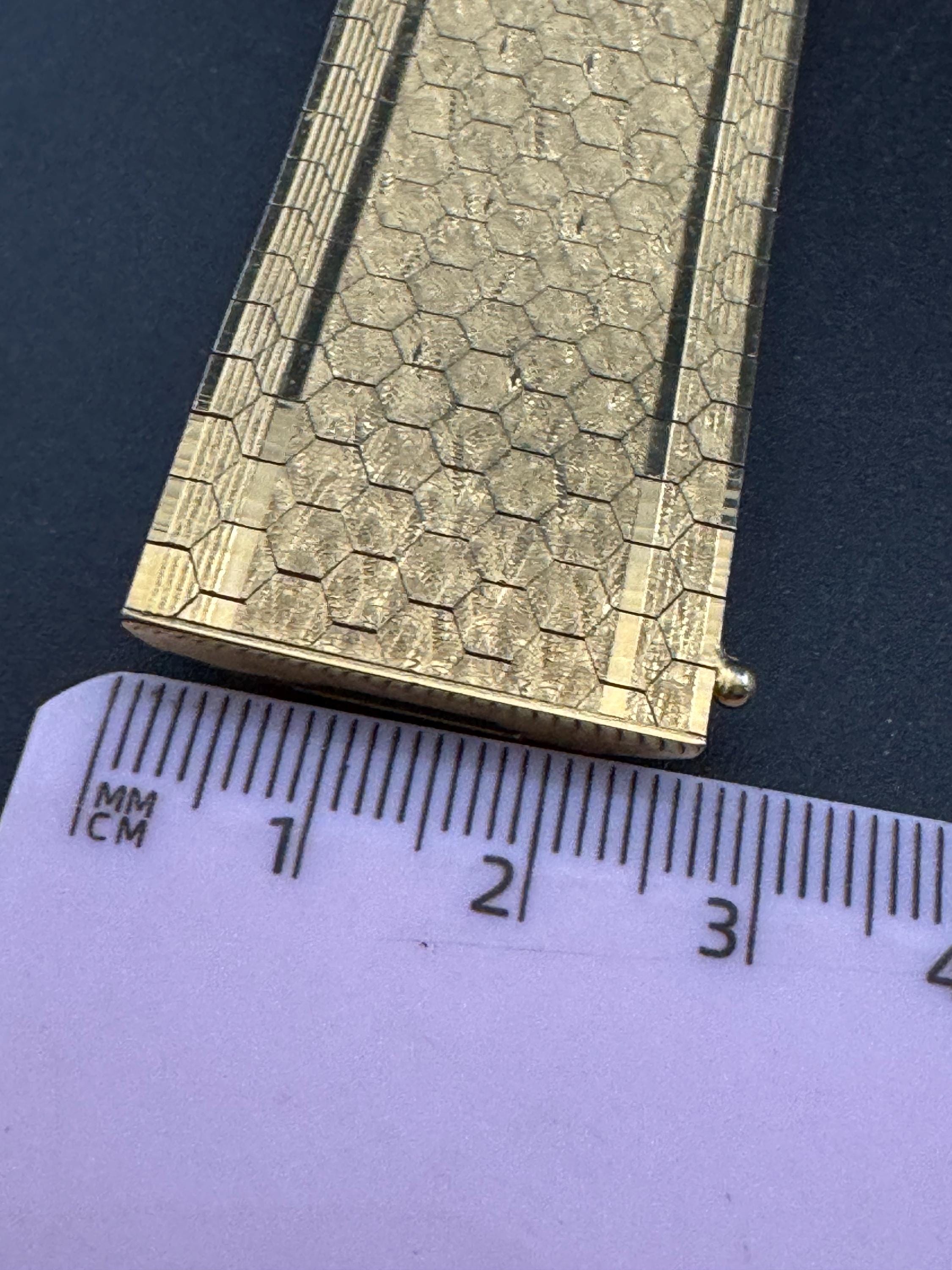 1970s 18k GP flat 2.6cm wide articulated cuff bracelet, Italian gold plated