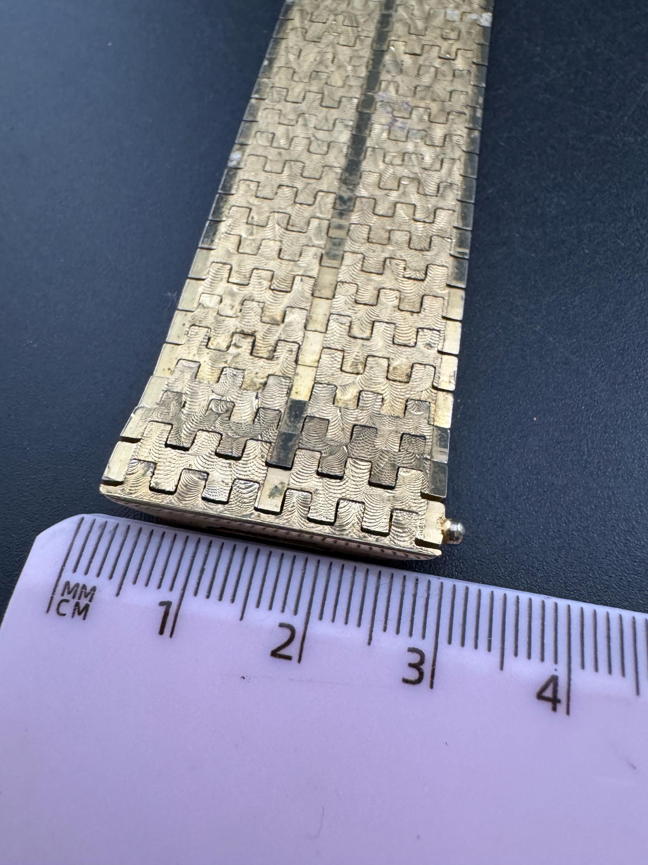 1970s 18k GP flat 3cm wide articulated cuff bracelet, Italian gold plated