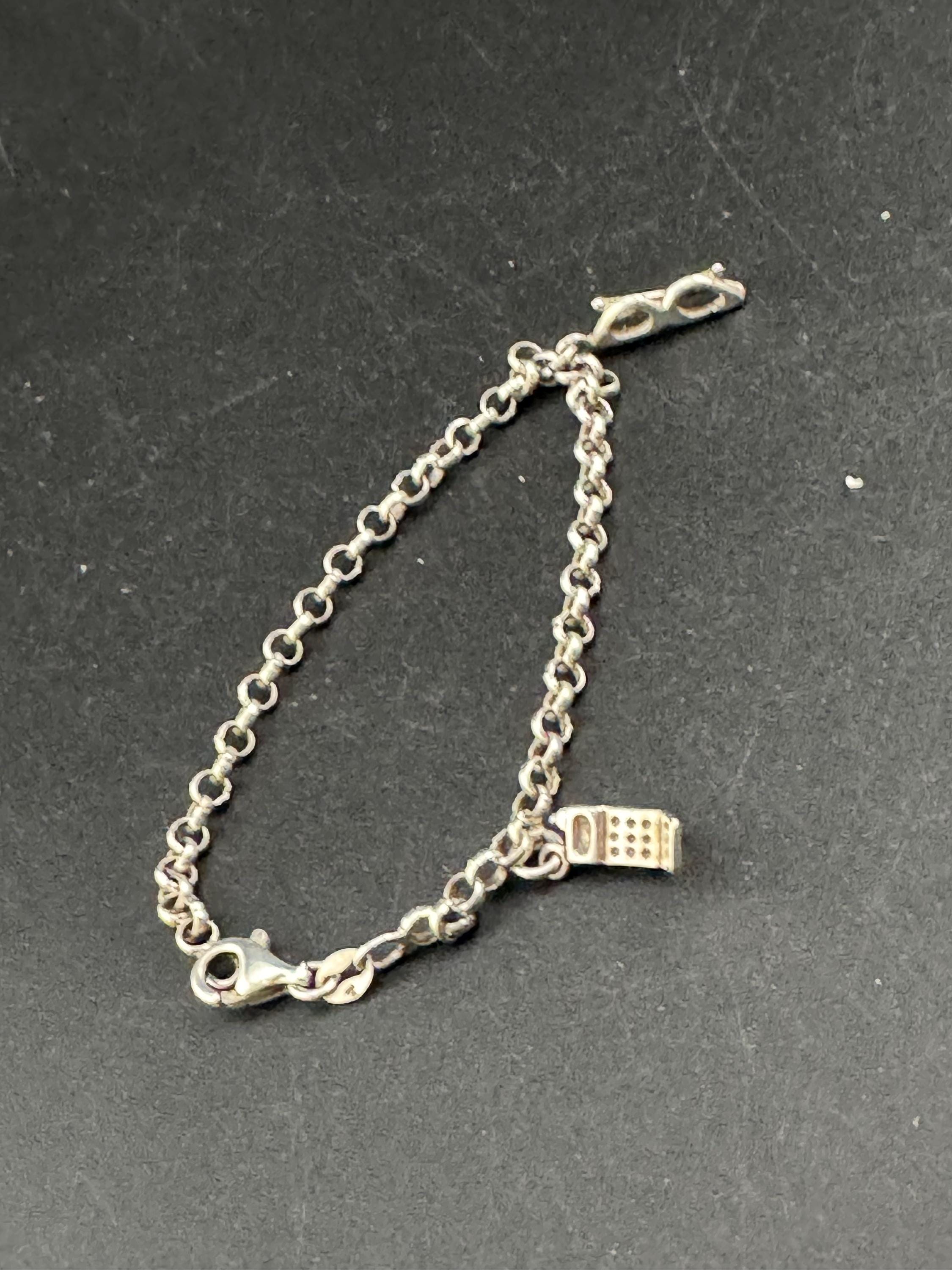 Vintage starter 925 plain charm bracelet, sterling silver with two charms