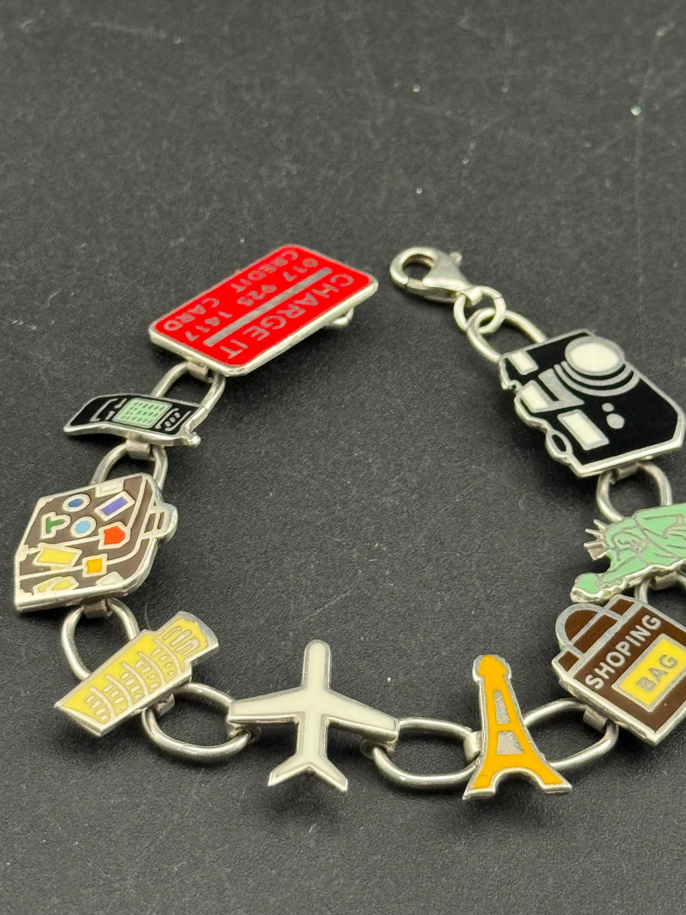 Quirky retro 925 travel themed charm bracelet, panel link in sterling silver
