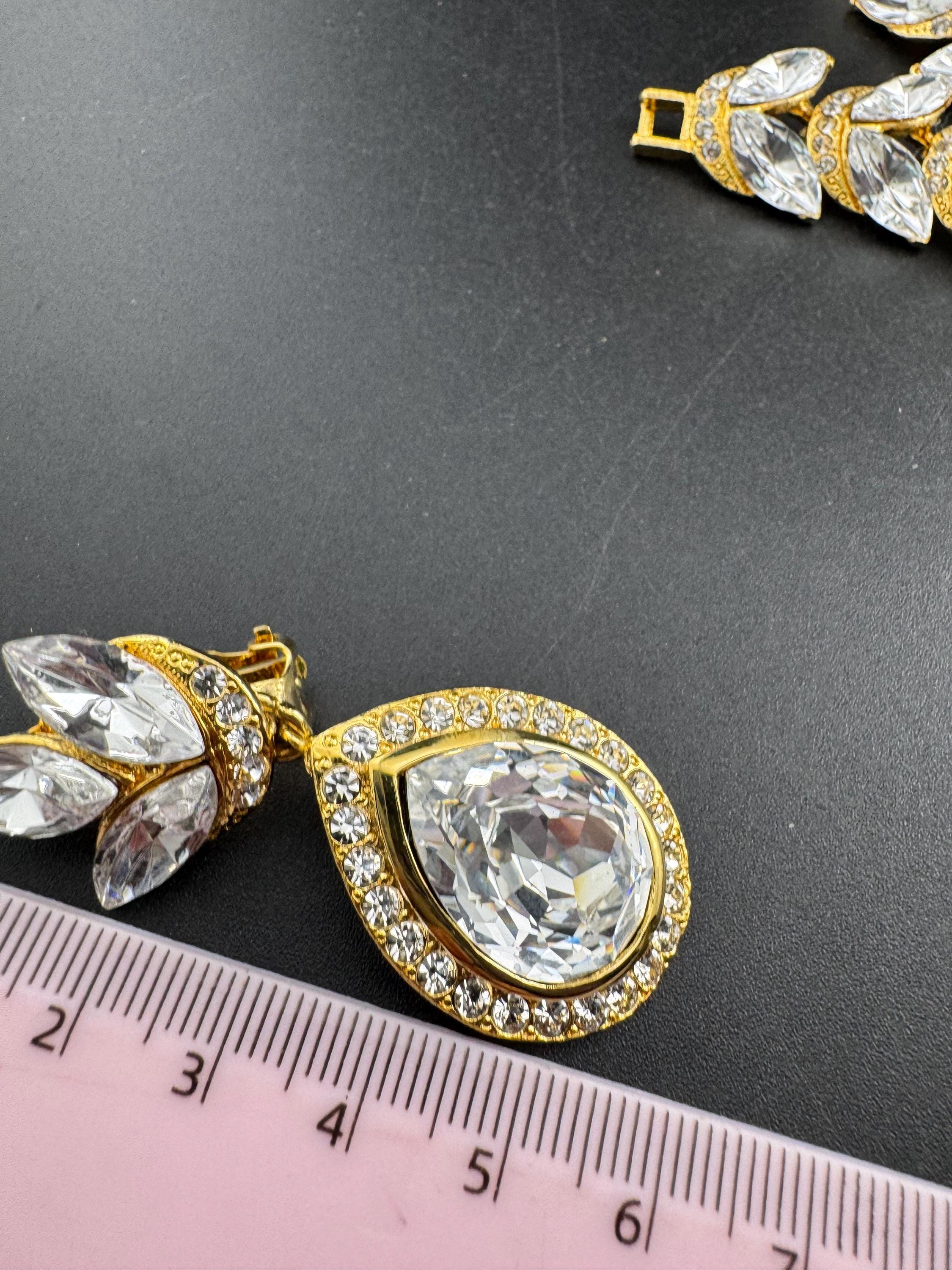 Vintage clear Swarovski crystal jewellery set, necklace,bracelet and clip on earrings.