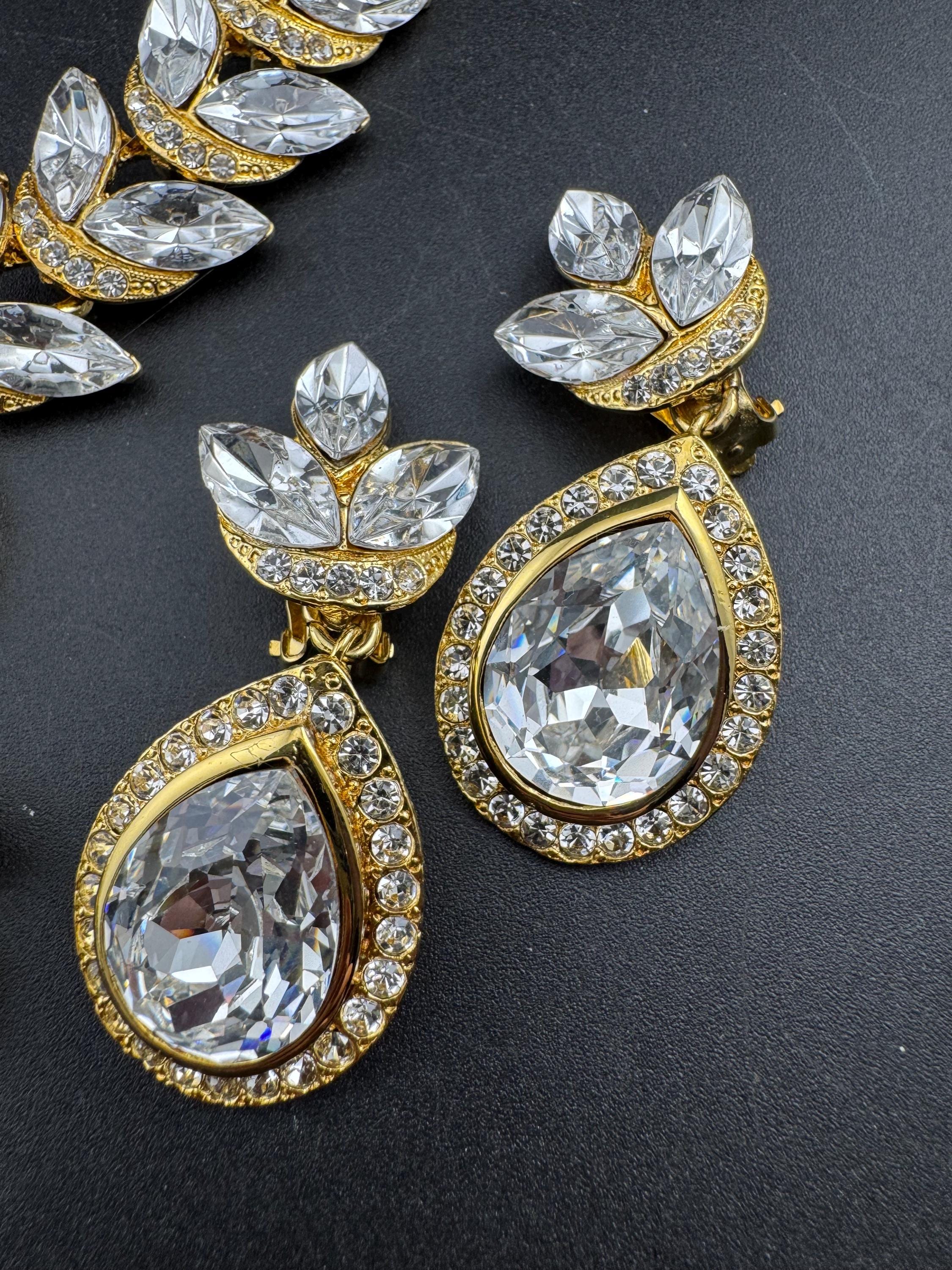Vintage clear Swarovski crystal jewellery set, necklace,bracelet and clip on earrings.