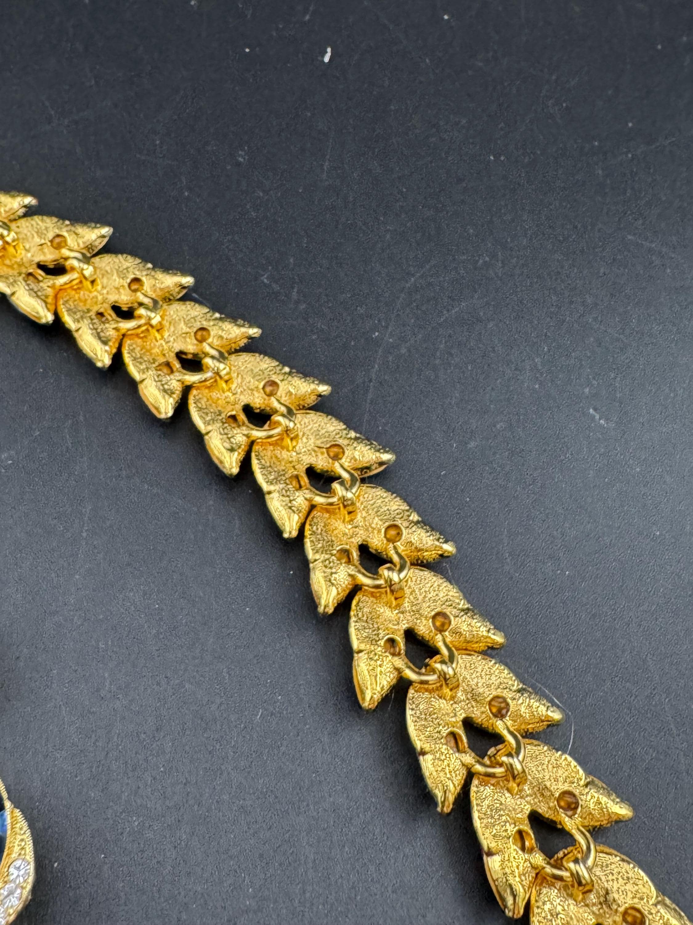 Vintage Swarovski Crystal Jewelry Set: Gold Tone Leaf Bracelet and Clip Earrings
