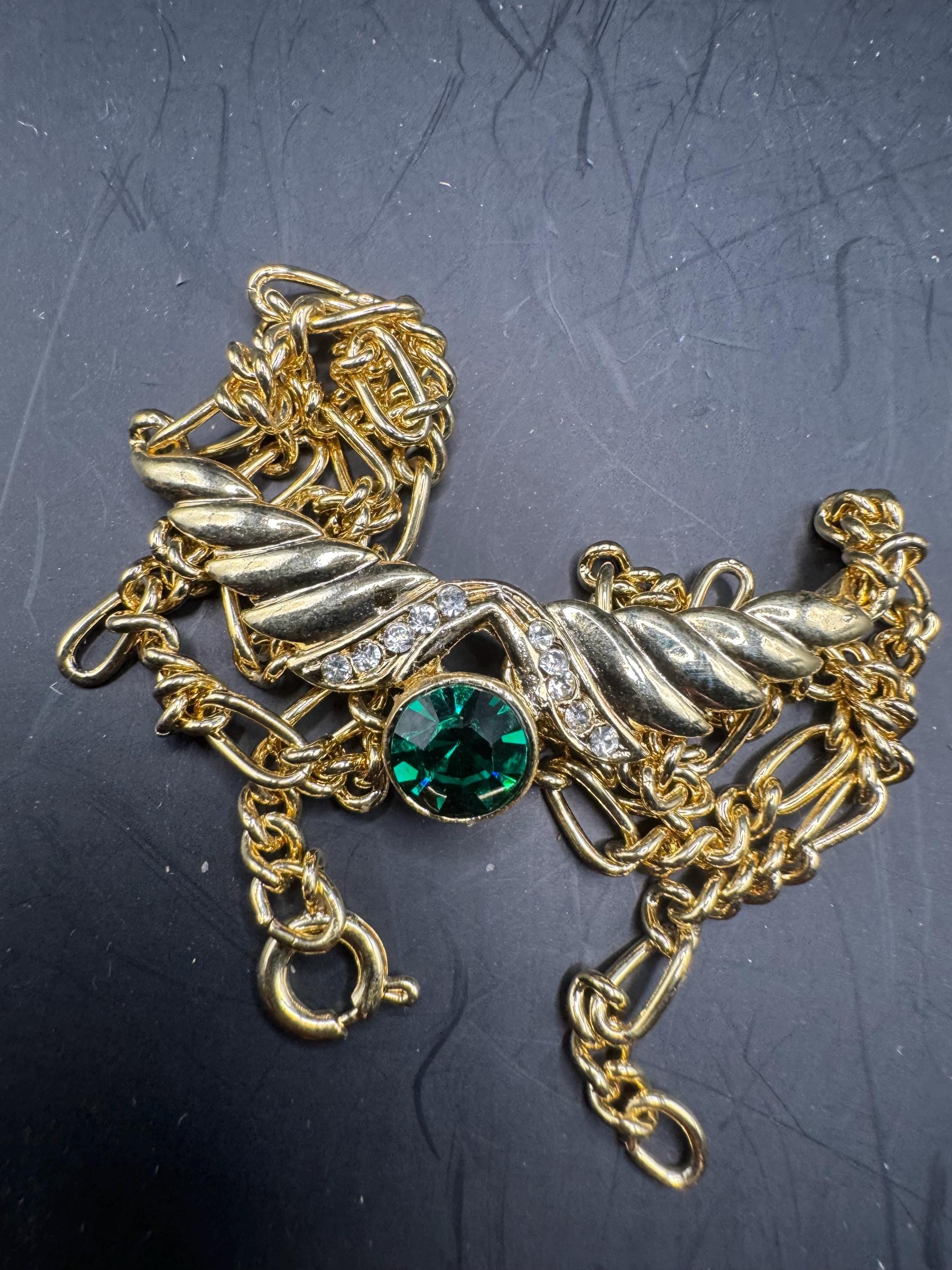 Gold Tone Figaro Chain emerald Necklace: Green Rhinestone