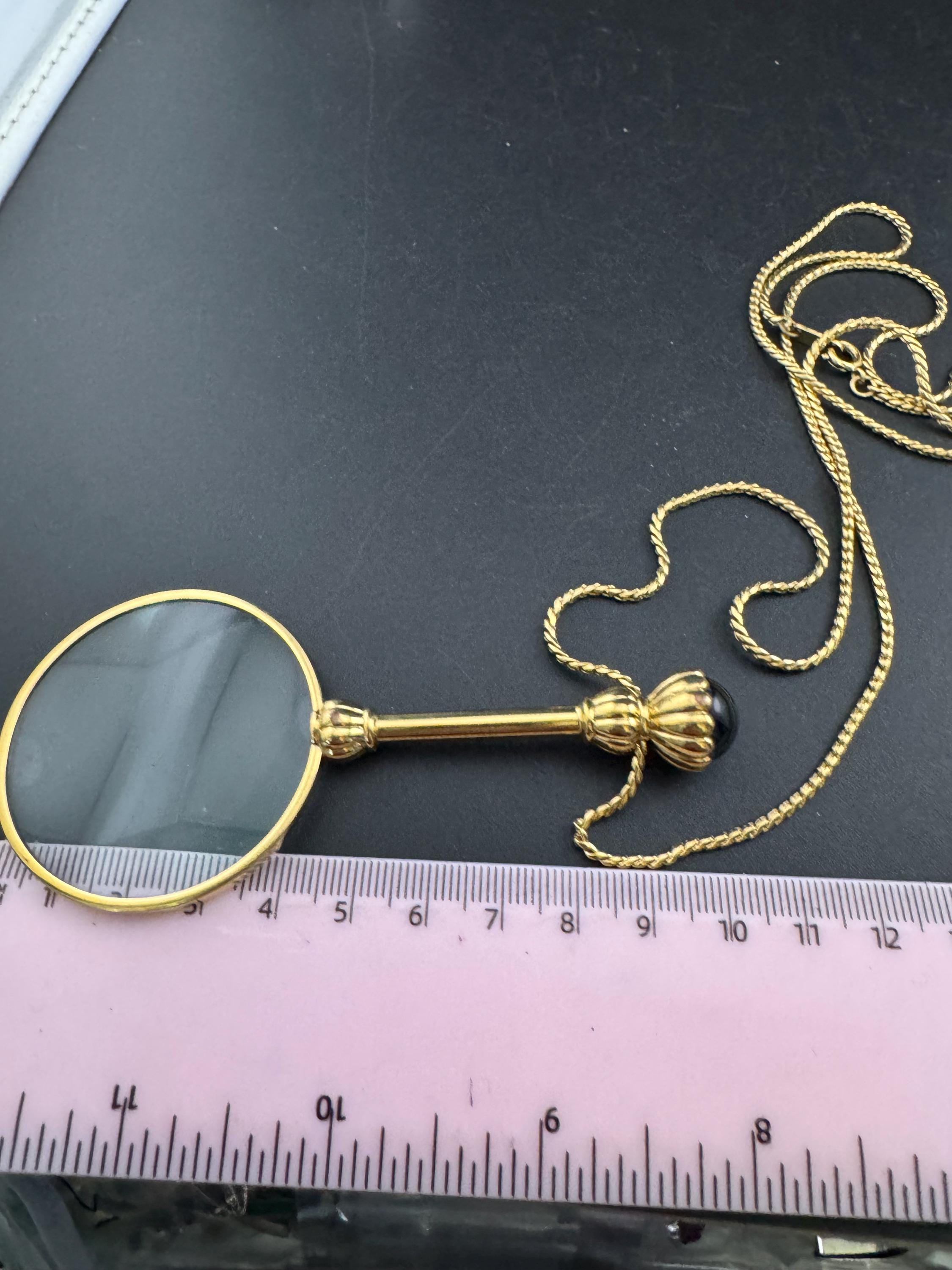 Vintage jewellers loupe eyeglass magnifier pendant necklace, gold plated with blue glass cabochon