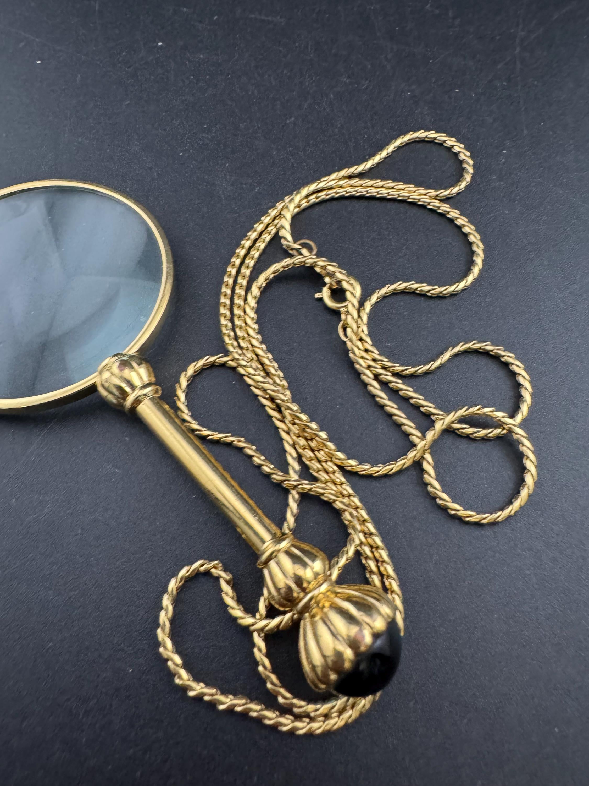 Vintage jewellers loupe eyeglass magnifier pendant necklace, gold plated with blue glass cabochon