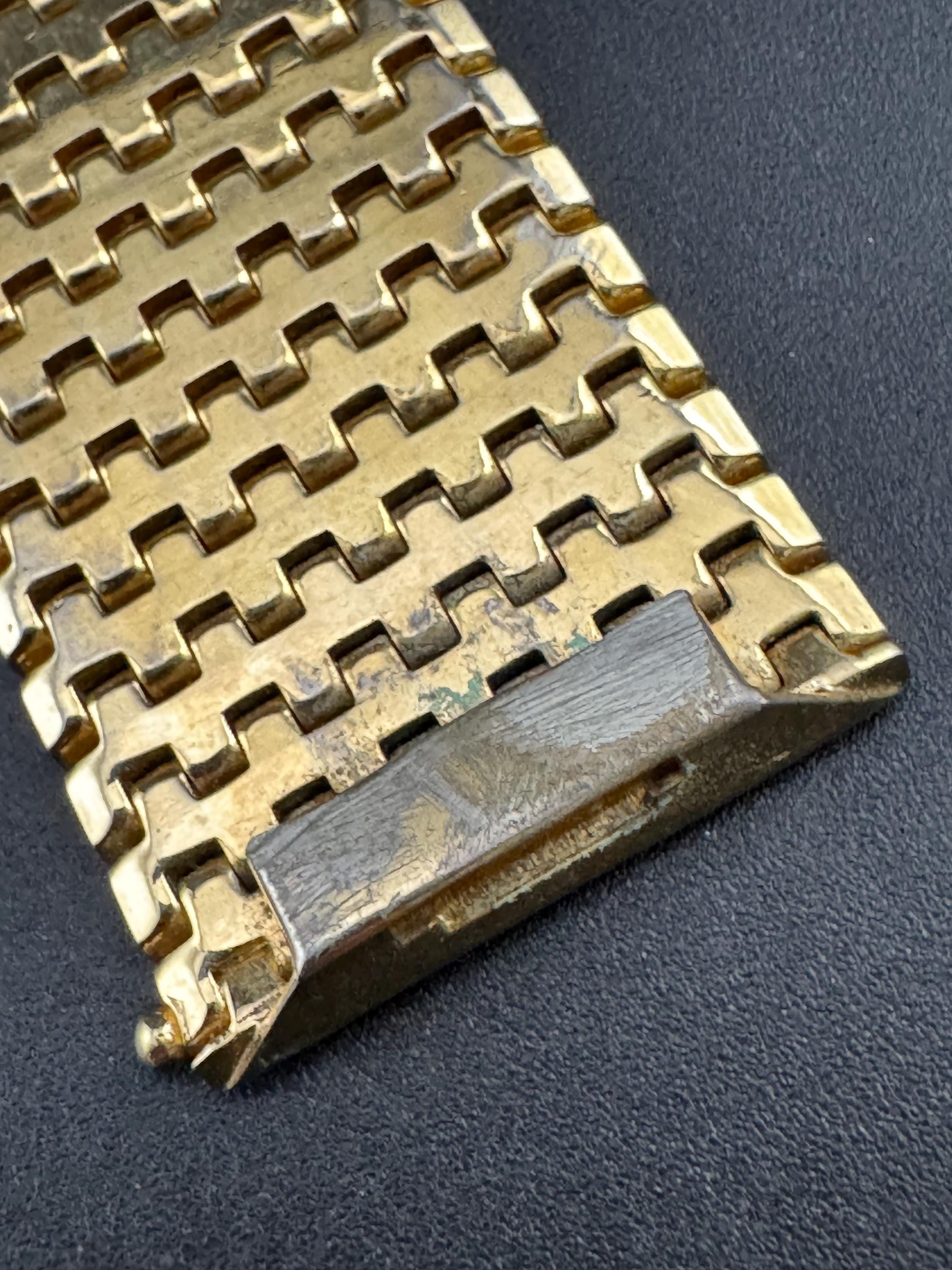 1970s 18k GP flat 3cm wide articulated cuff bracelet, Italian gold plated