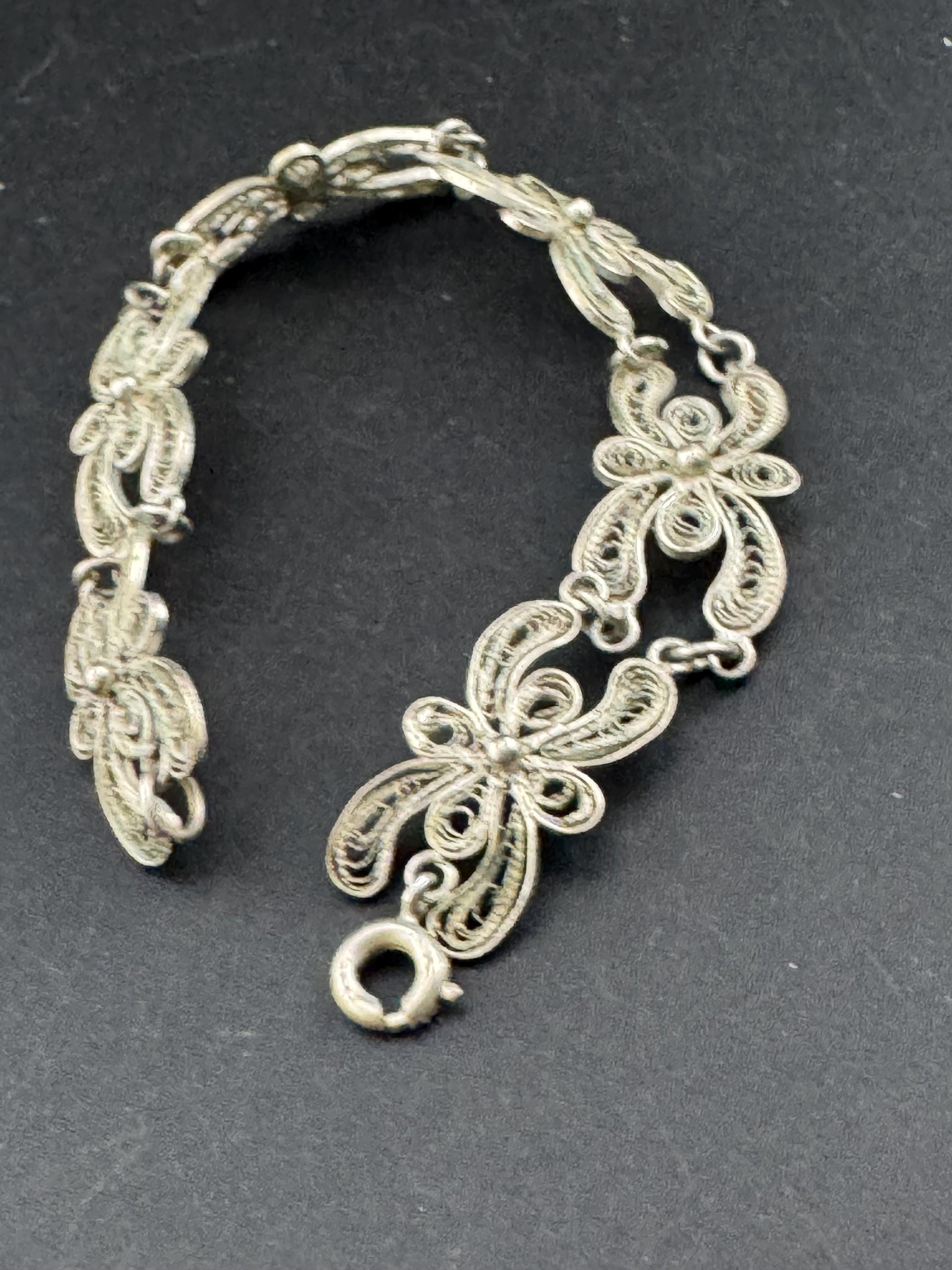 Antique vintage continental sterling silver panel link filigree bracelet.