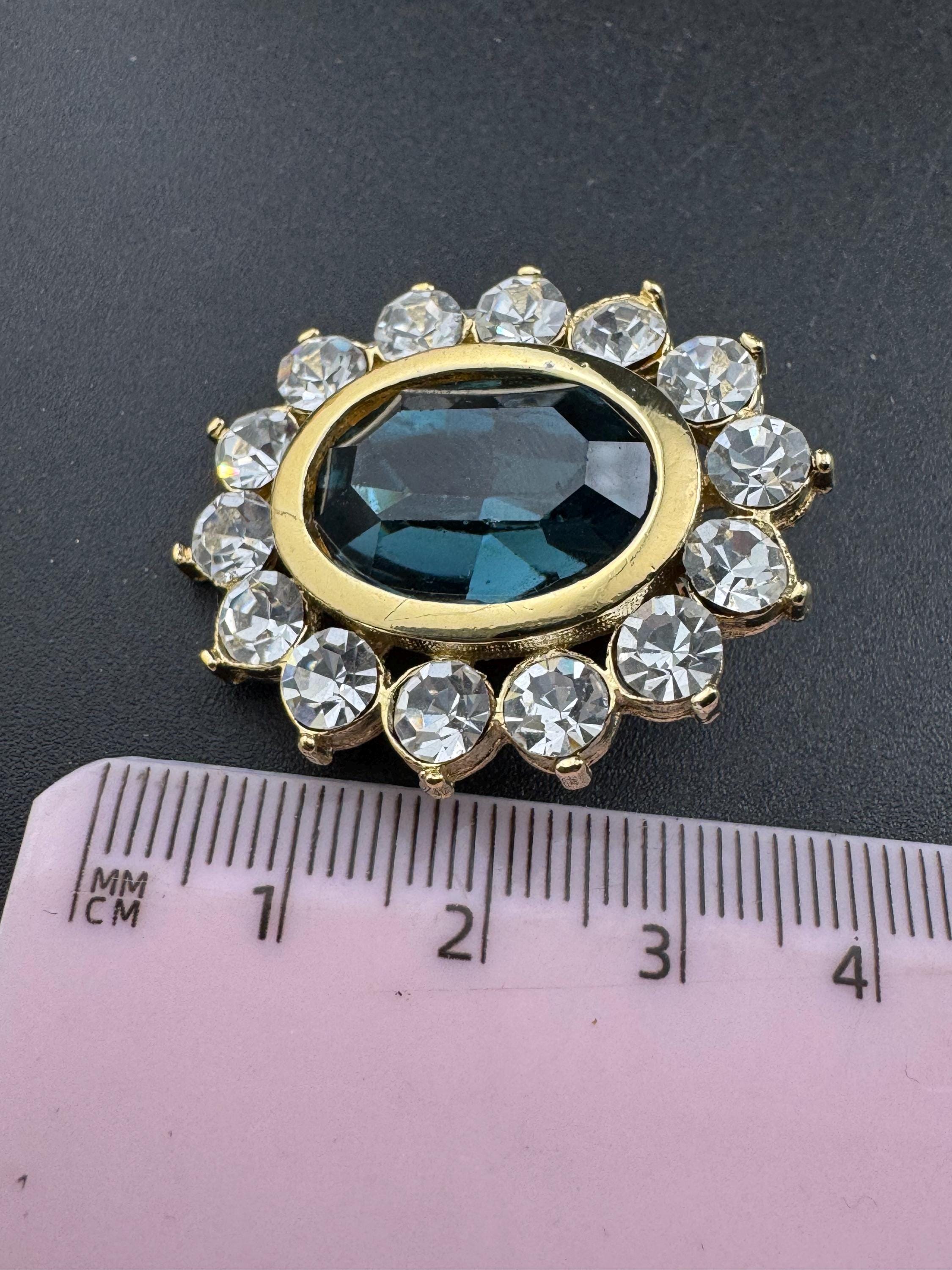 Sapphire blue oval oversized Swarovski earrings, clip on gold tone